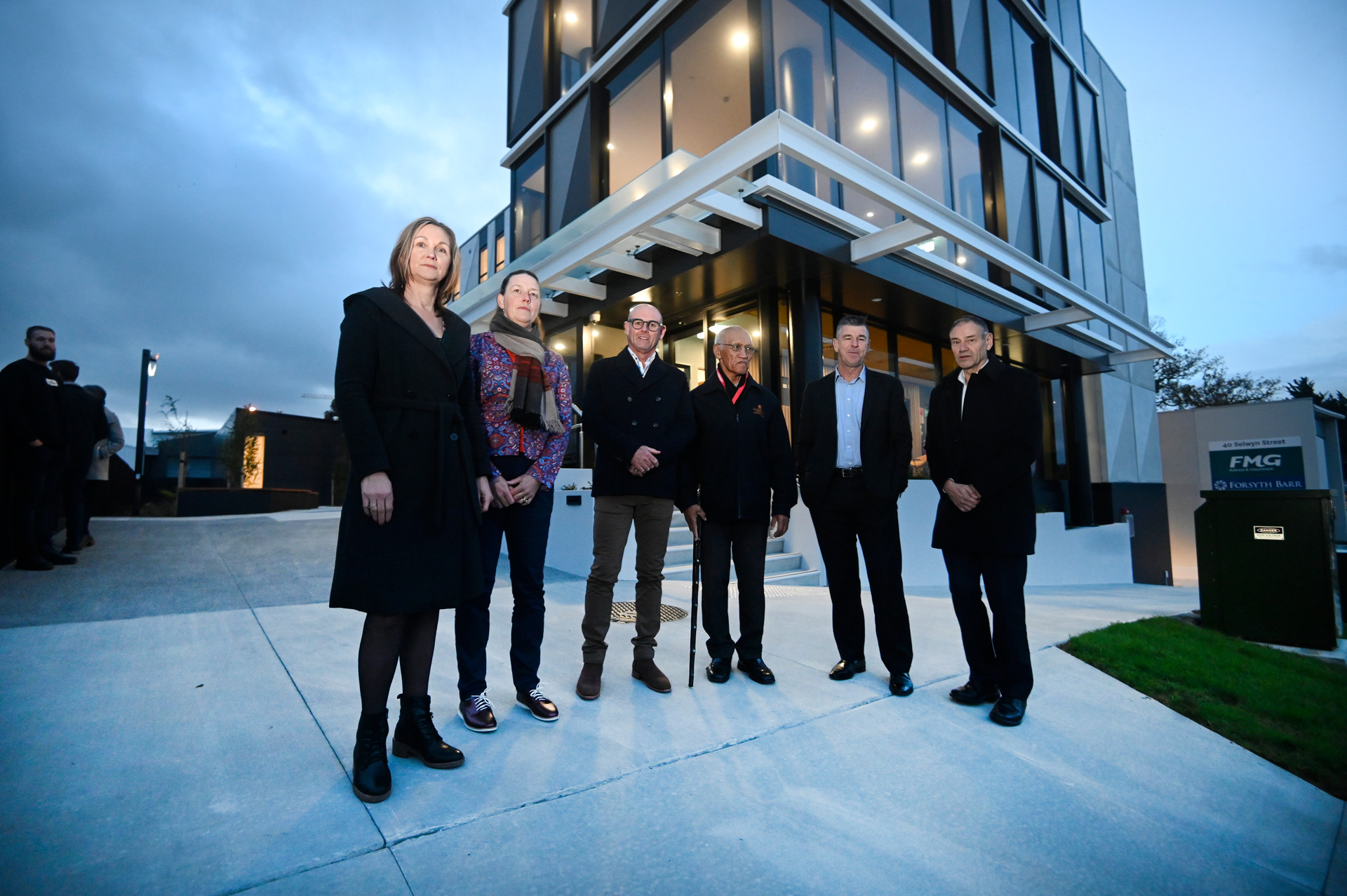 Lynda Lipinski, Iris Beemster, John McColl, kaumatua Tamati Tata, Marty Grenfell, and Alister Jones in front of the new Selwyn Street Studios. Photo / George Novak