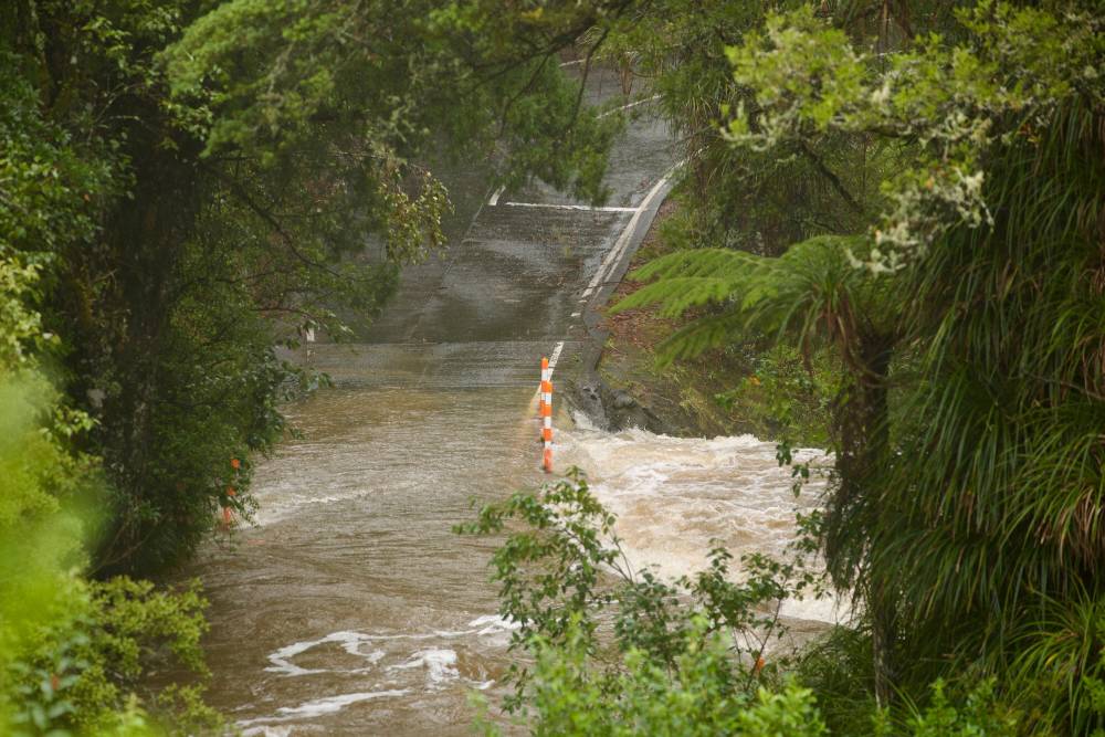 A man and his vehicle were washed away at a river crossing on Falls Rd, Warkworth, on Wednesday morning. Photo / Jason Dorday