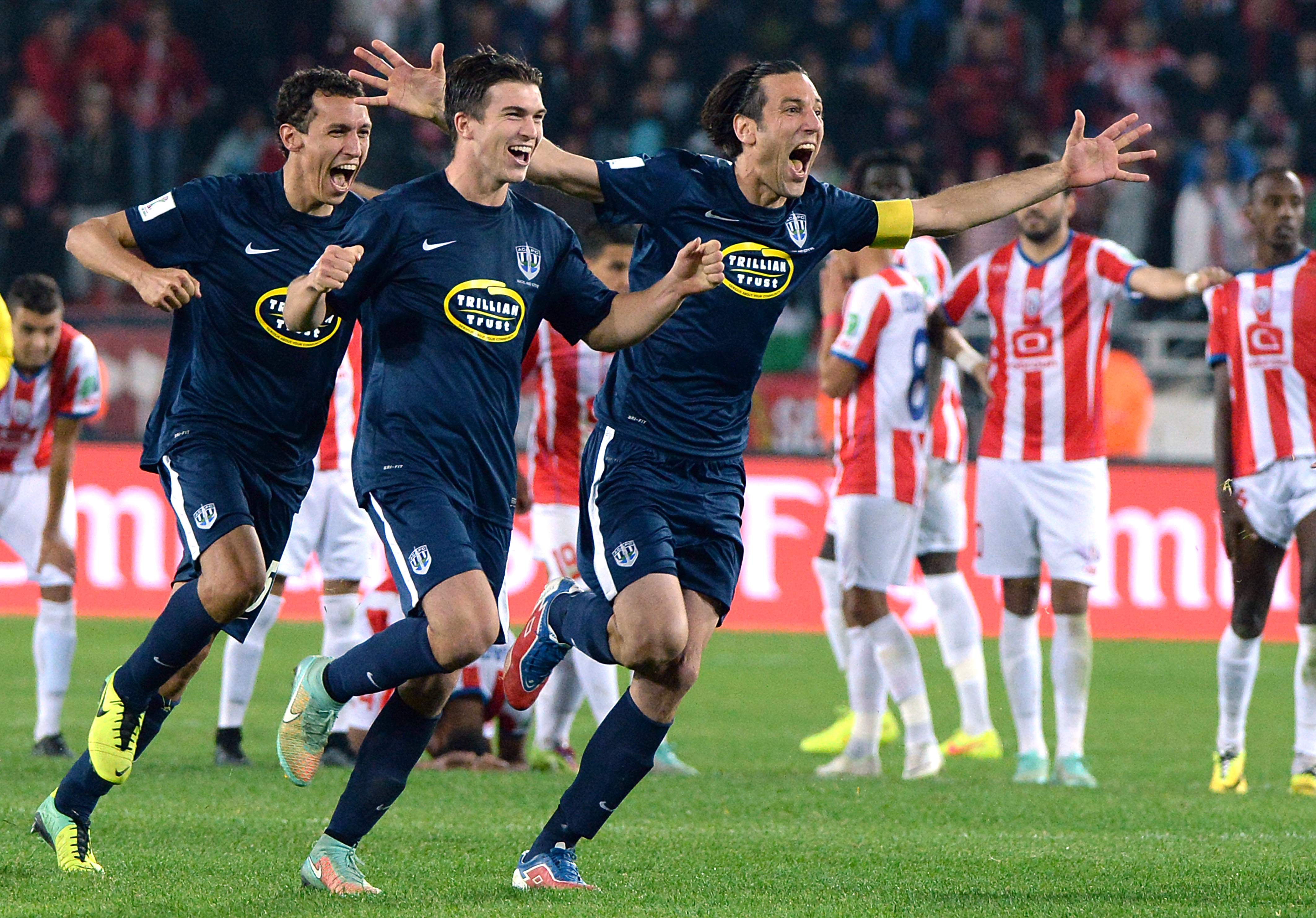 Auckland City FC's players celebrate during their remarkable run during the 2014 Fifa Club World Cup. Photo / AFP