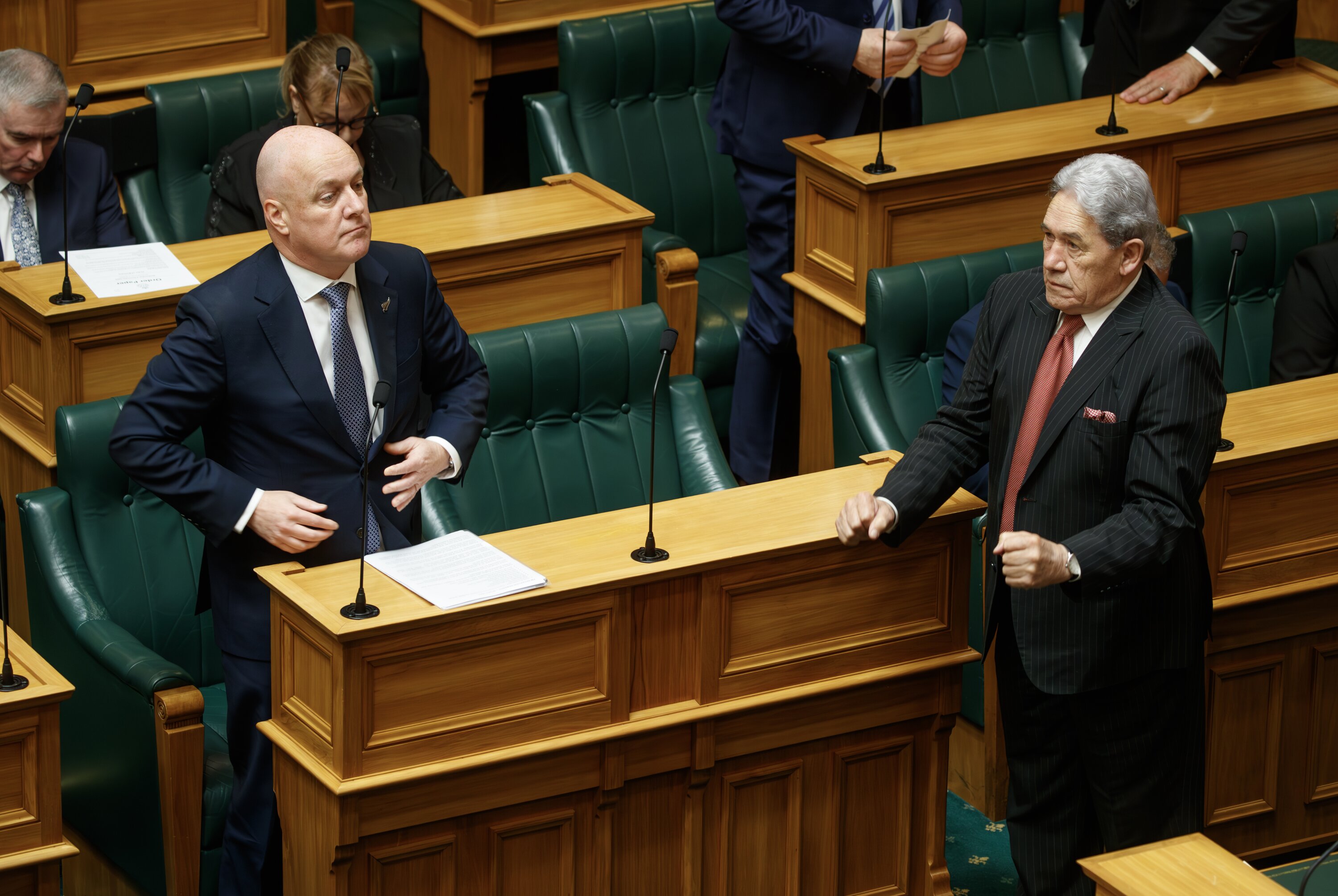 Christopher Luxon and Winston Peters adjusting their jackets at the conclusion of the State Opening of Parliament, Photo / Mark Mitchell