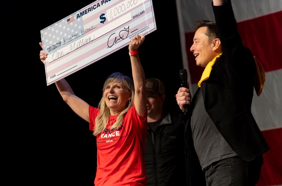 SpaceX and Tesla founder Elon Musk gave Kristine Fishell $1 million at the Roxain Theatre. Photo / AFP