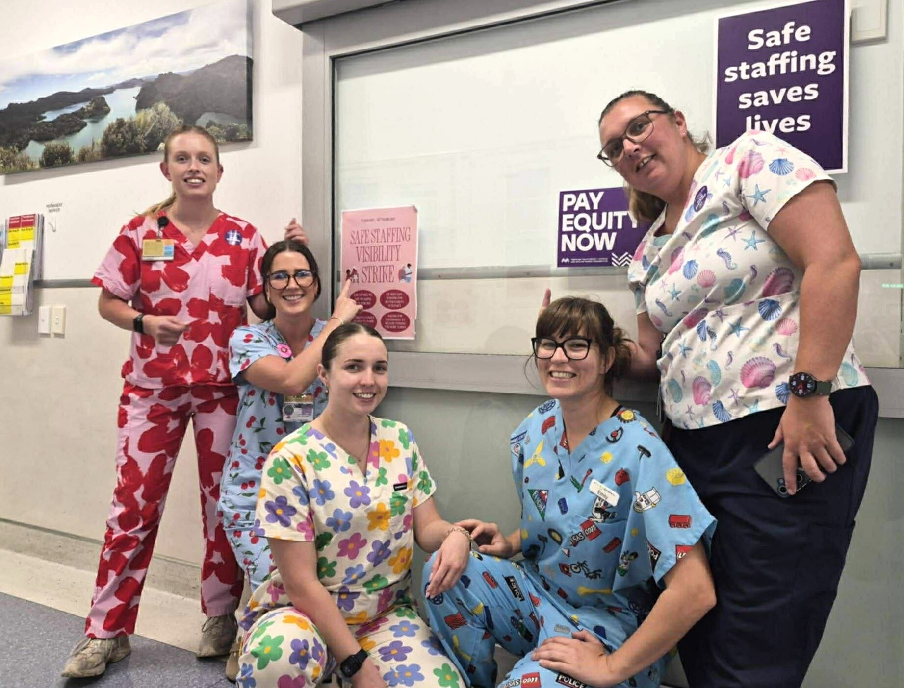 Nurses wearing bright-coloured clothing as part of the NZ Nurses Organisation uniform strike include Kylie Johnson (from left), Sammy Reed, Jess Bennett, Emily Camuso and Nicole McGinty.