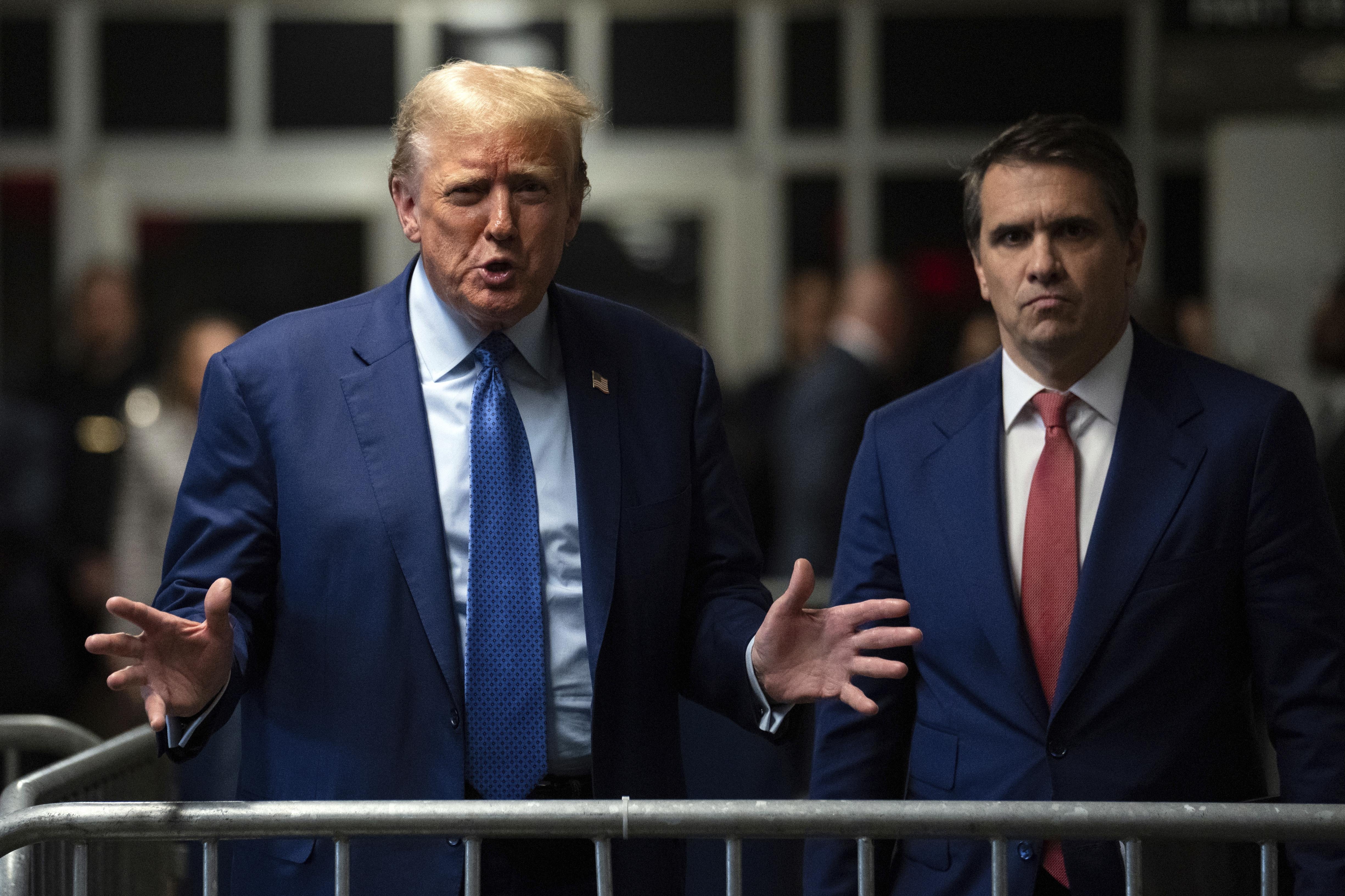 Trump speaks to members of the media at Manhattan criminal court on May 9. Photo / AP