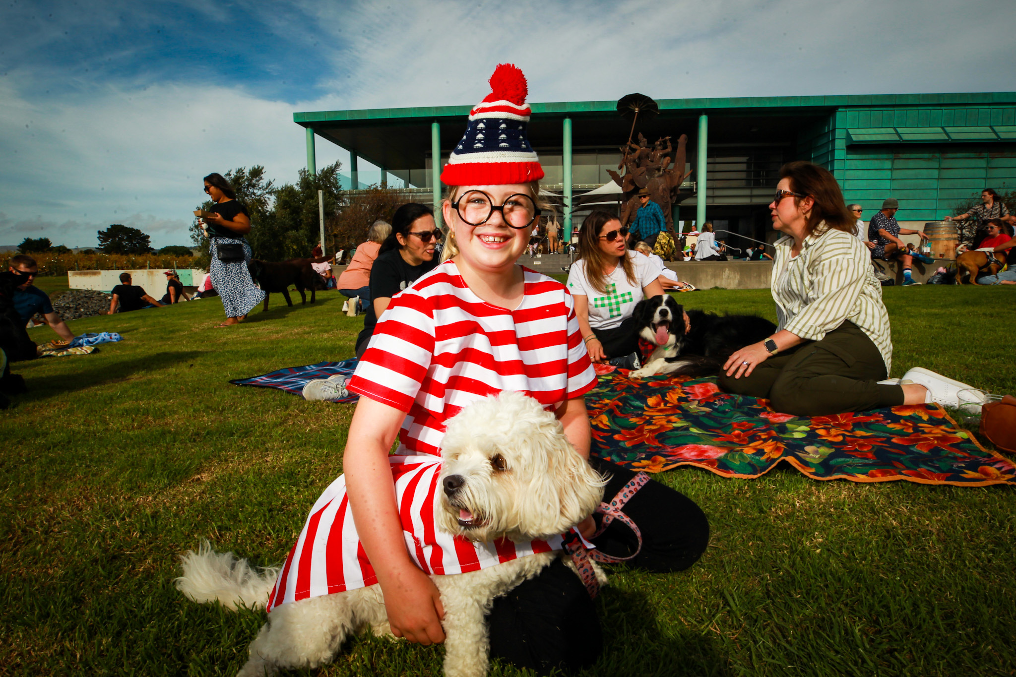 Tessa Renshaw, 9, with Molly from Napier wine dogs event at Elephant Hill. Photo / Paul Taylor