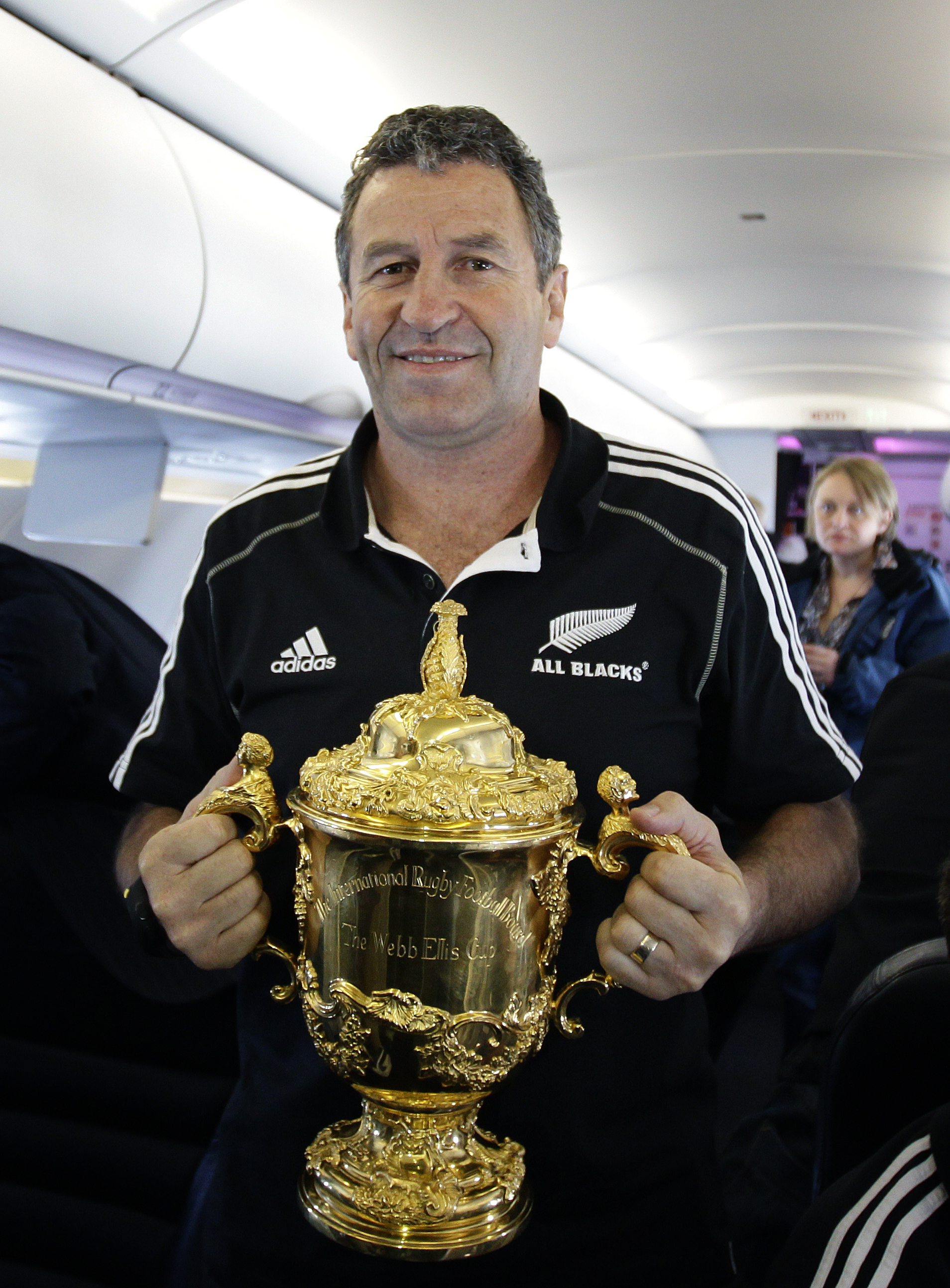 Sir Wayne Smith, pictured with the Rugby World Cup after the All Blacks beat France in 2011. Photo / Sarah Ivey