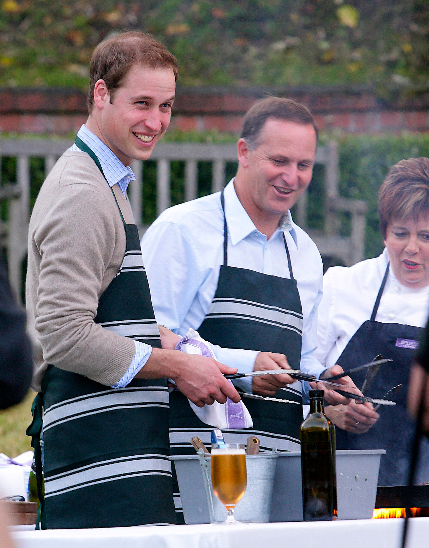 Prince William and then Prime Minister John Key cooking up a BBQ at Premier House in 2010. Photo / pool