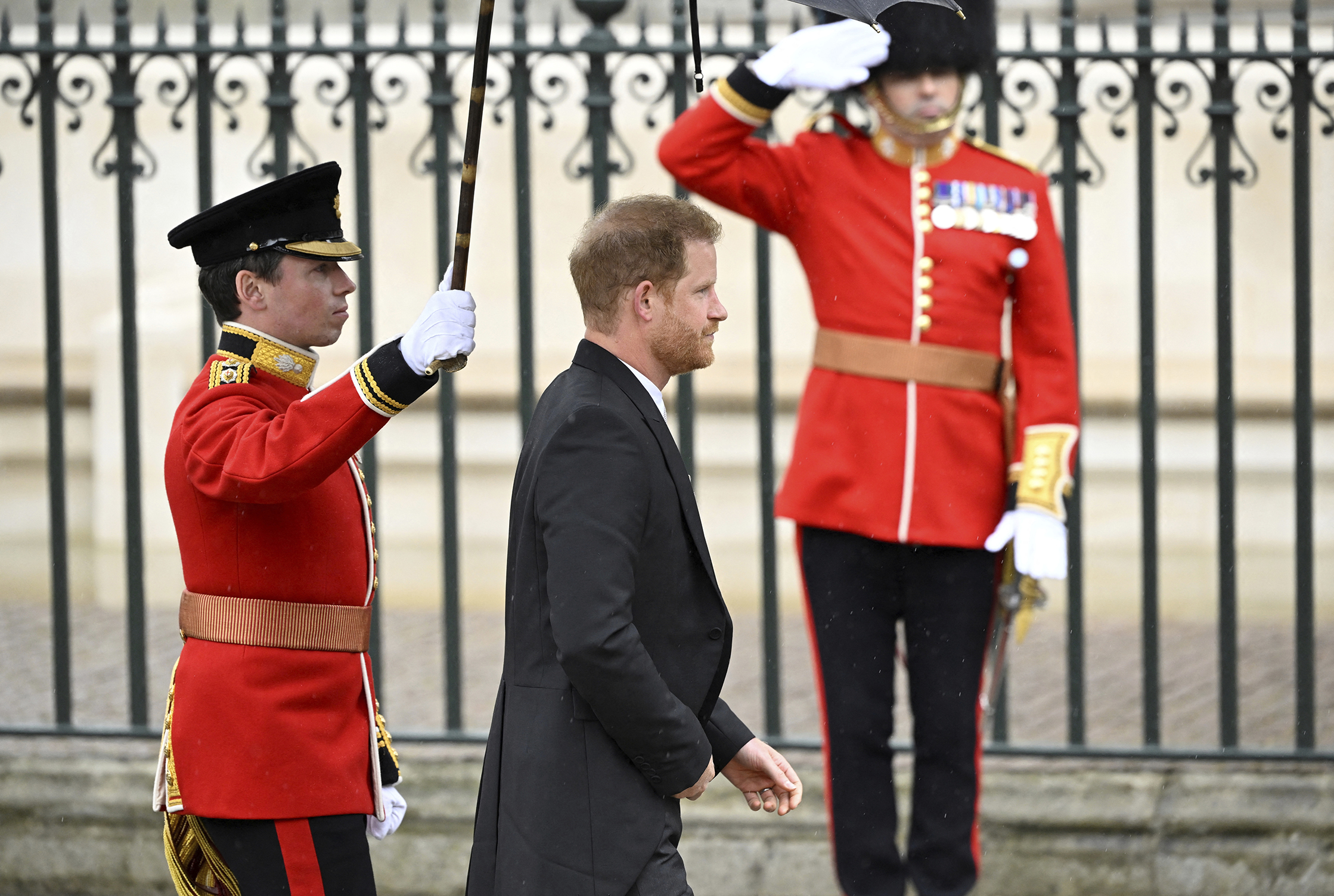 Prince Harry arrives at his father's coronation ceremony at Westminster Abbey. Photo / AP