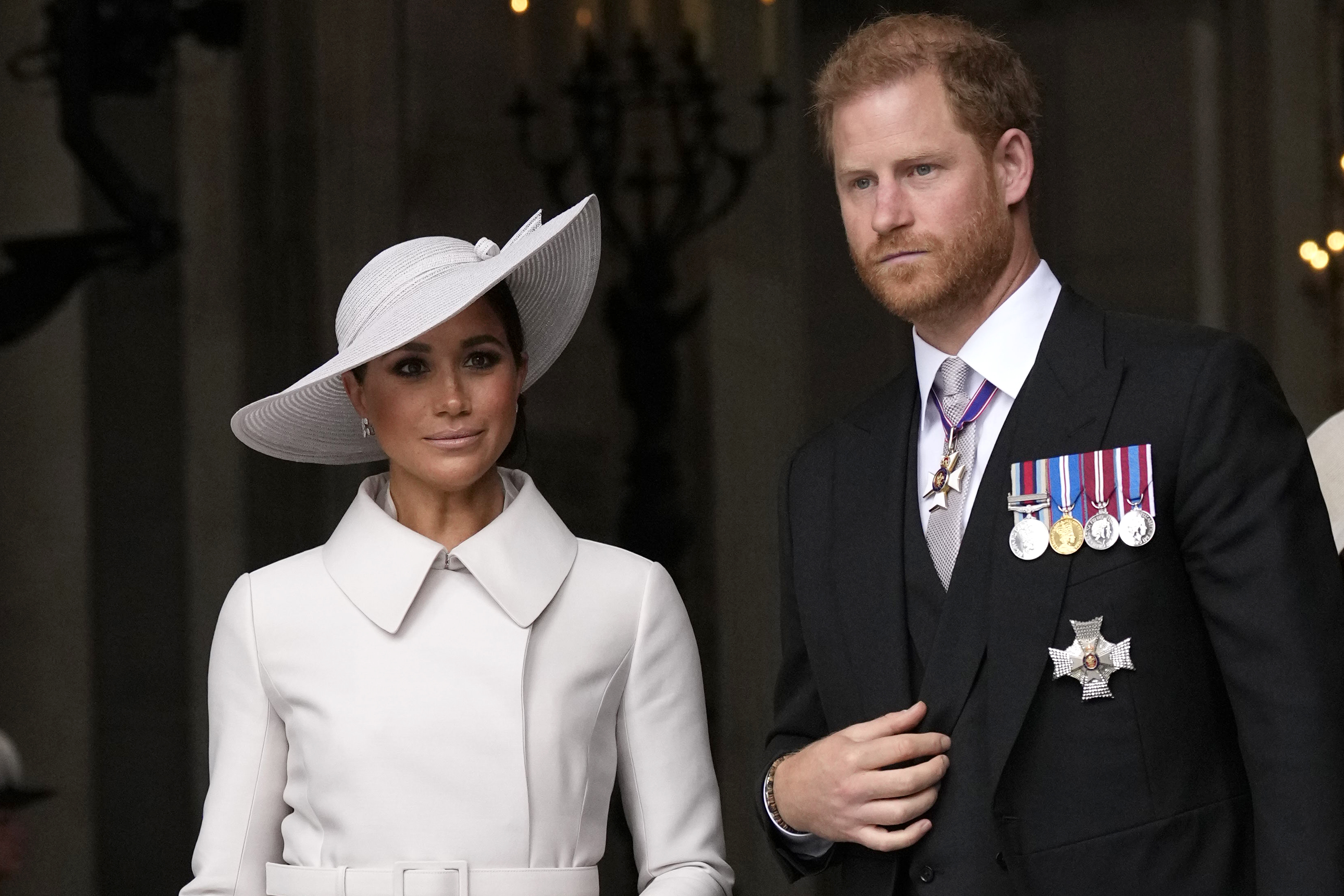 Prince Harry and Meghan Markle, Duke and Duchess of Sussex leave after a service of thanksgiving for the reign of Queen Elizabeth II at St Paul's Cathedral in London, Friday, June 3, 2022. Photo / AP