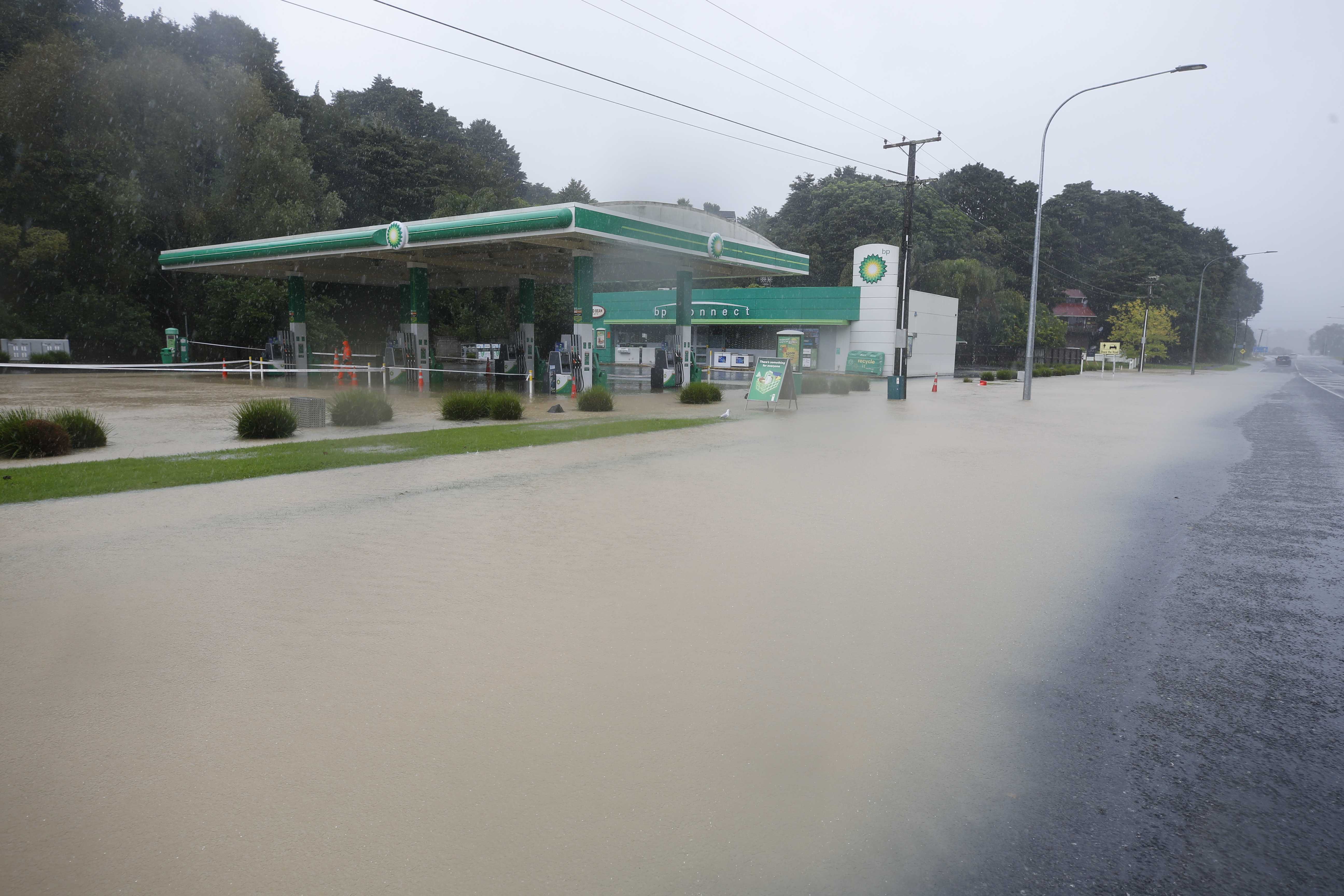 Flooding at the BP petrol station on Riverside Dr. Photo / Michael Cunningham