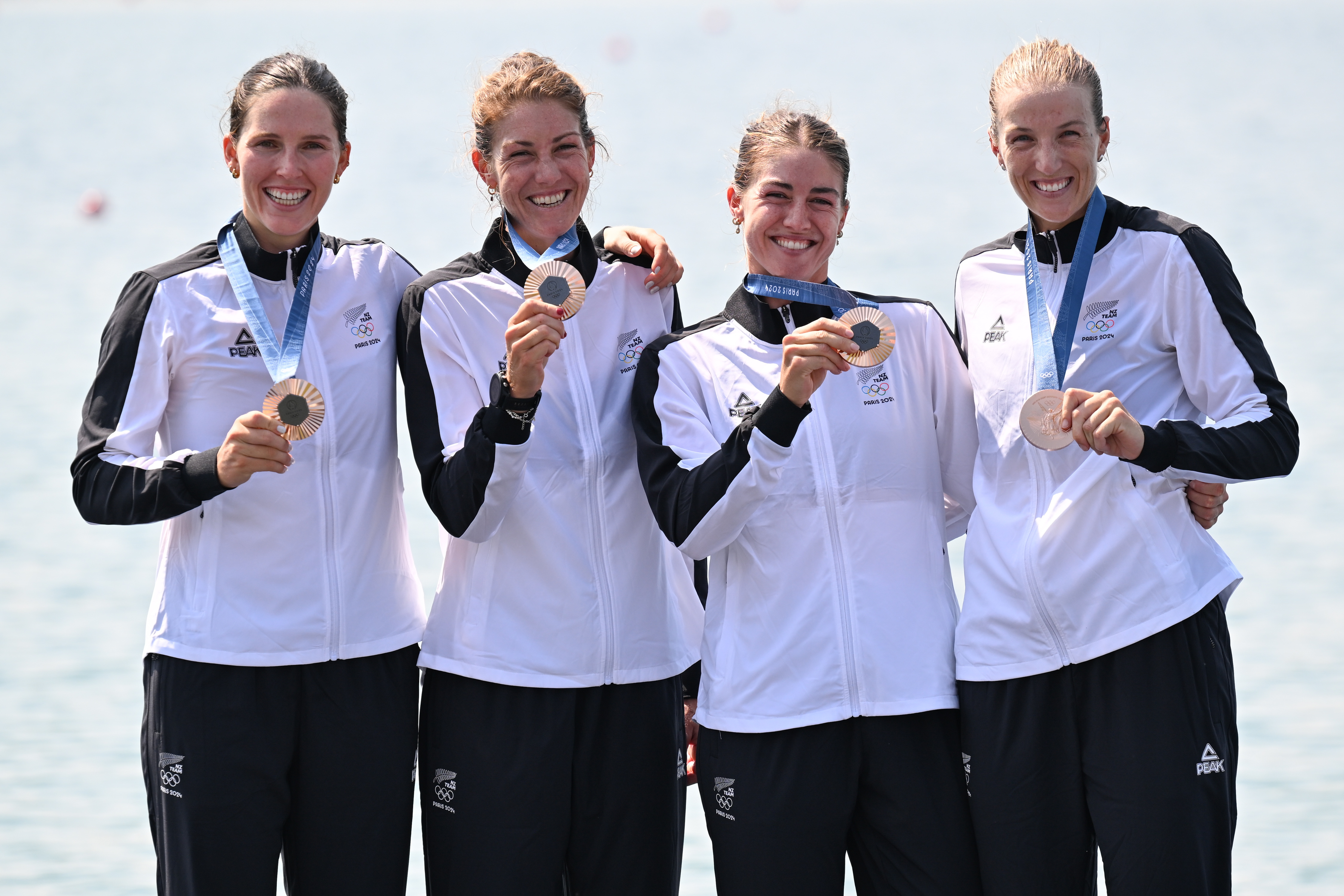 Davina Waddy, Kerri Williams, Jackie Gowler and Phoebe Spoors celebrate bronze. Photo / Photosport