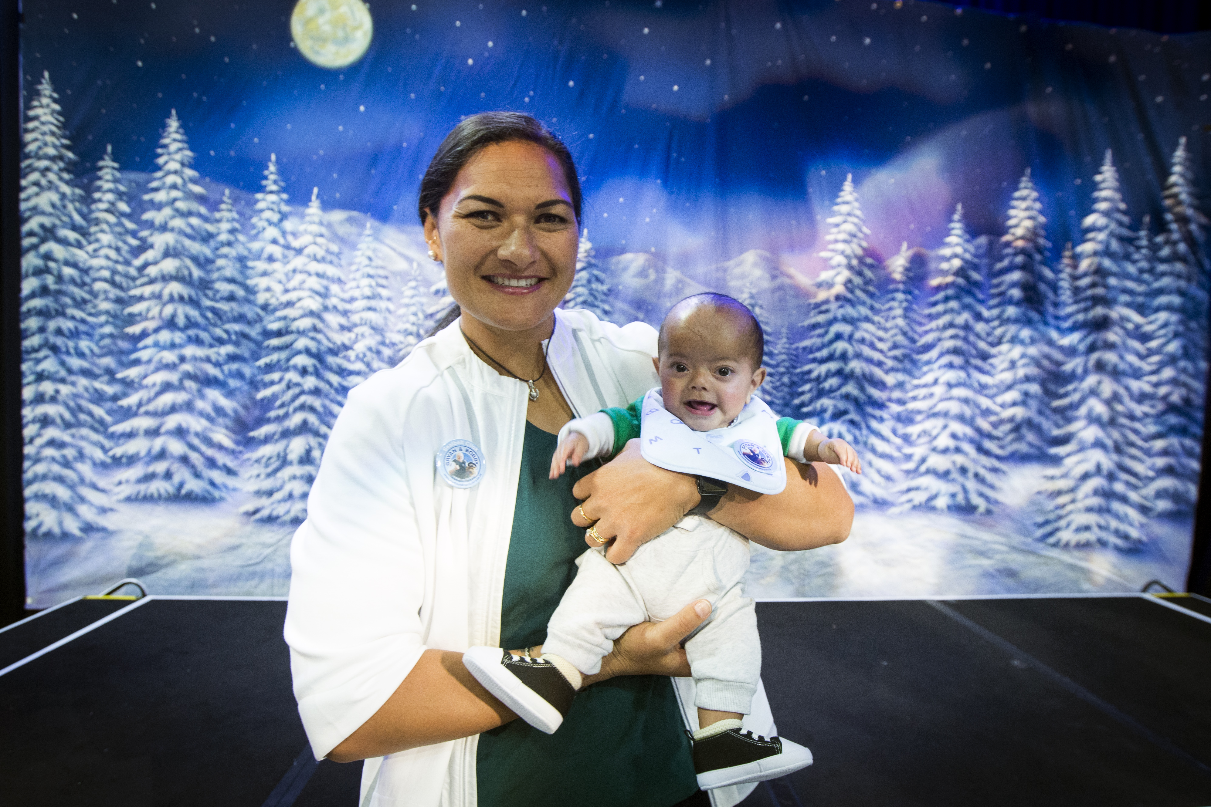 Olympic silver medalist Val Adams with Jarmas Brayer Tuvae, 9 months, at the Kidz First Children's Hospital Christmas party. Photo / Jason Oxenham