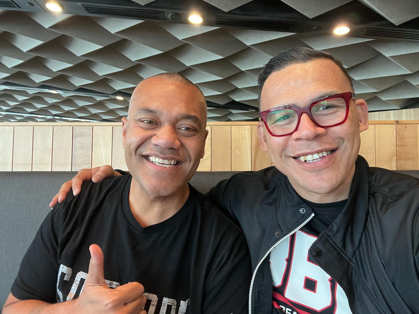 Efeso Collins and community leader Dave Letele pose together in 2022. Photo / Dave Letele