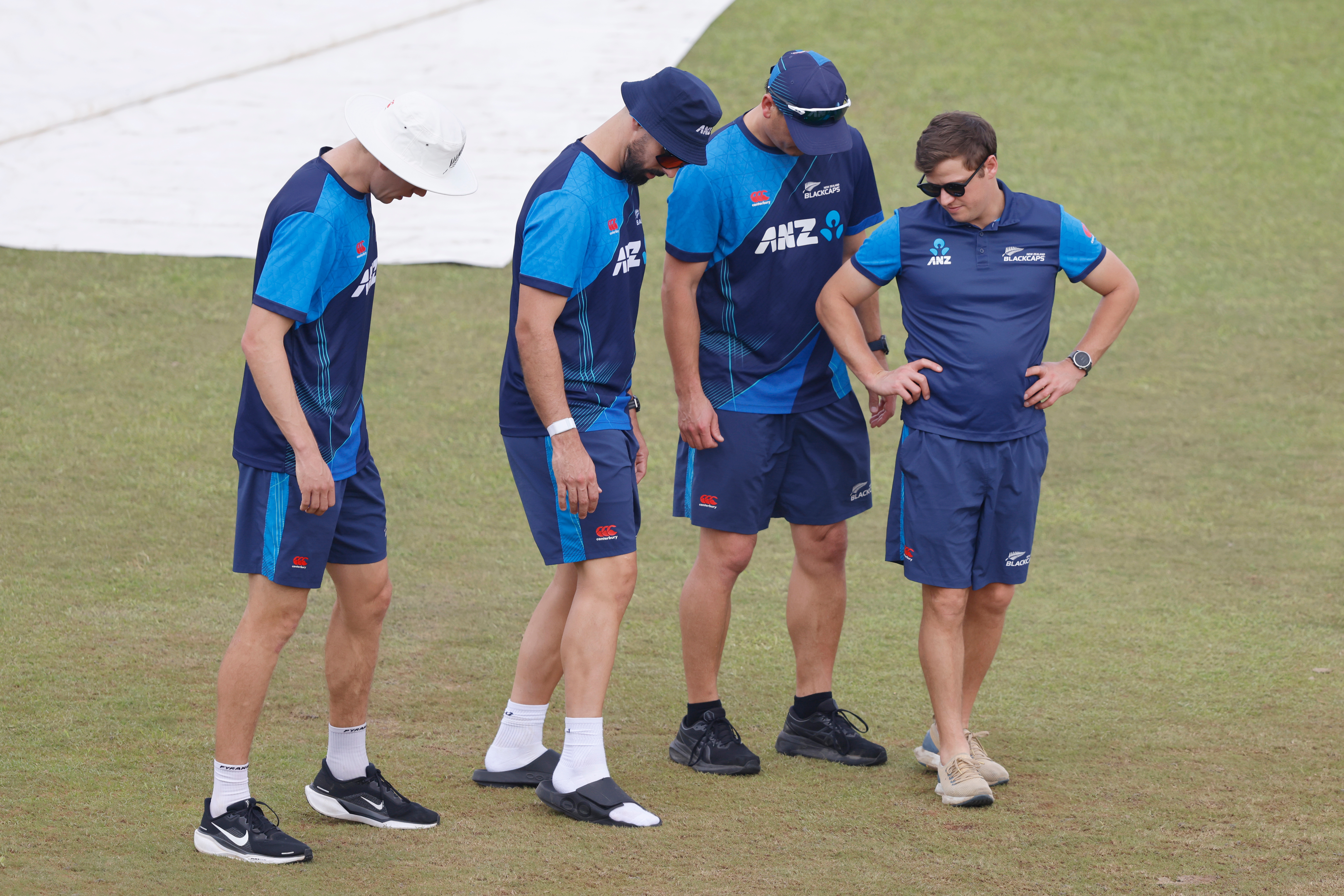 Black Caps players assess the ground in Greater Noida, where they were due to play Afghanistan. Photo / Photosport