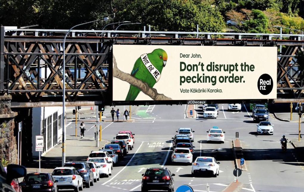 RealNZ's kākāriki karaka Bird of the Century billboard. Photo / RealNZ