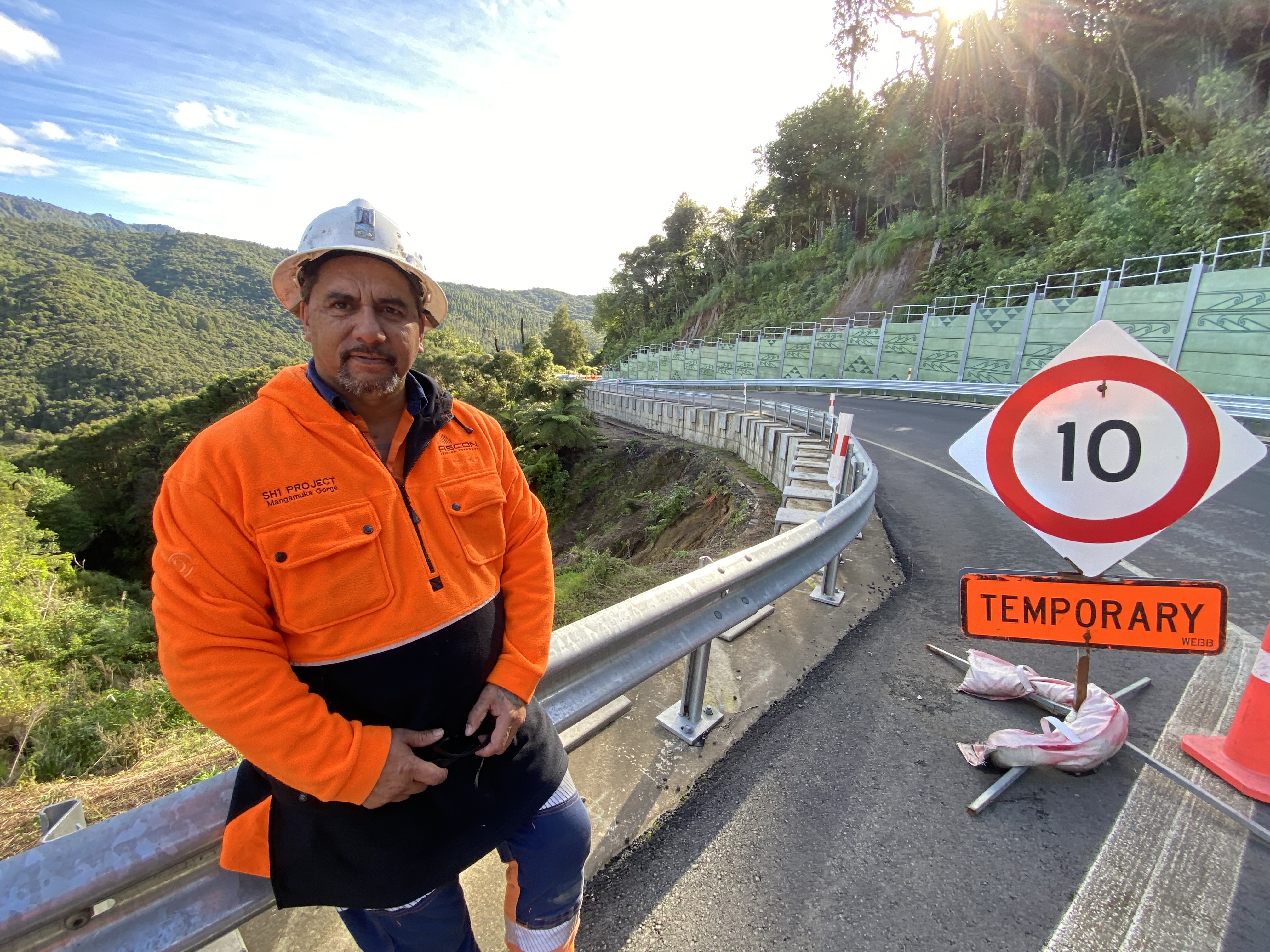 Site supervisor Tomo Otene with the 2020-21 repairs in the background. The earlier work largely survived the 2022 deluge. Photo / David Fisher