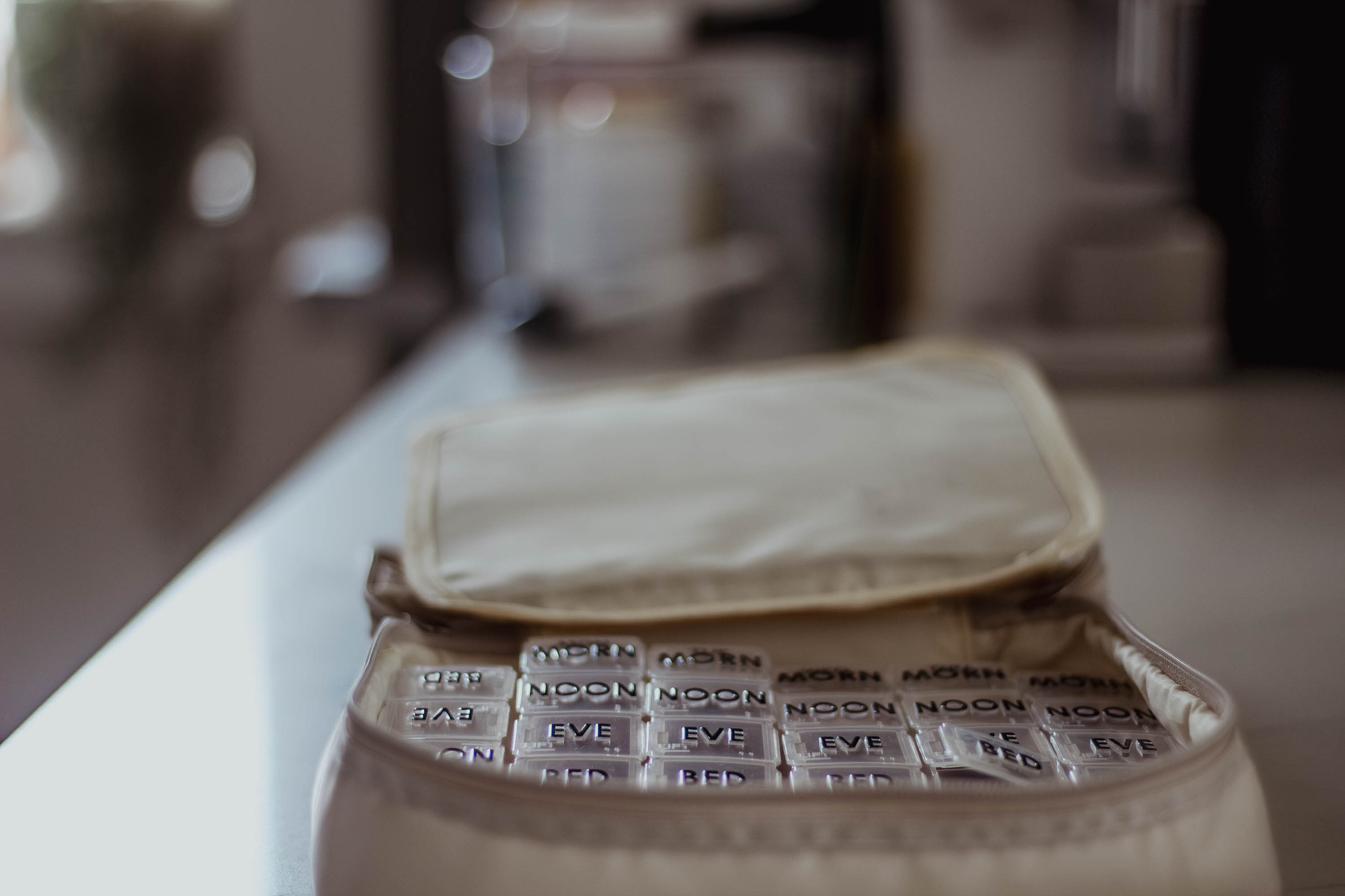 Amina AlTai uses a pillbox to keep track of all of her medications. Photo / New York Times