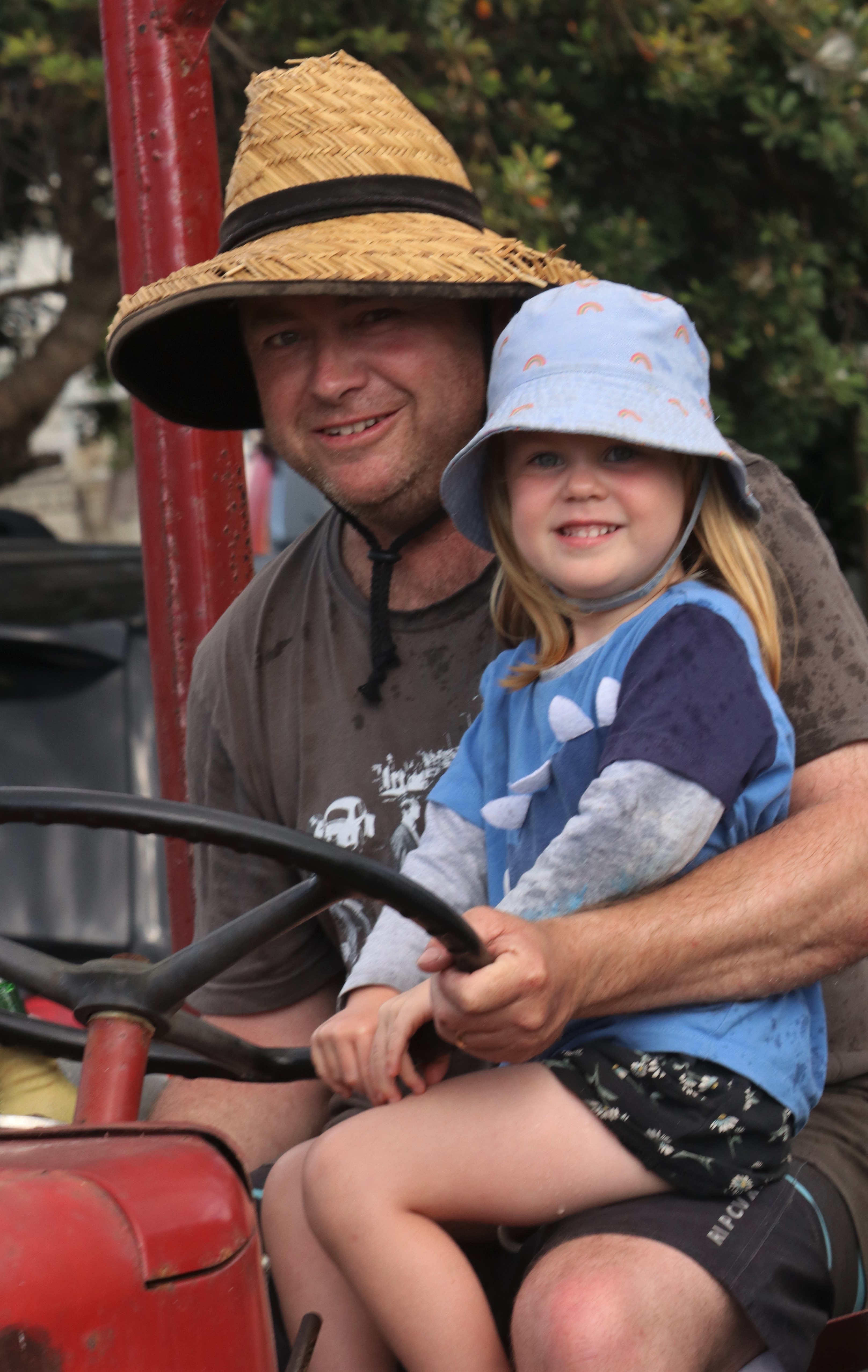 Three-year-old Athena Scott get a ride with Uncle Scooter of Whangārei. Photo / Peter de Graaf