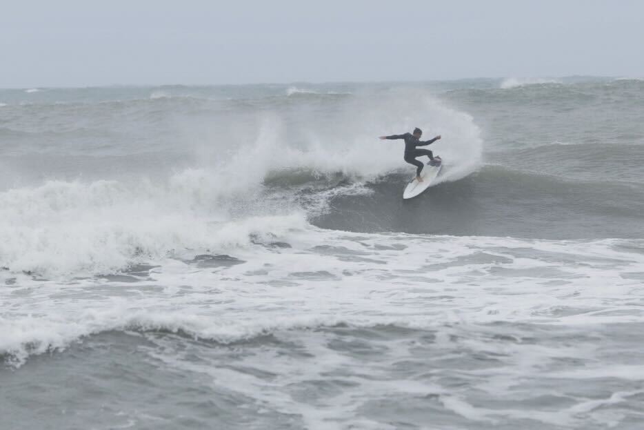 Rough seas at Mount Maunganui didn't deter some brave - or foolhardy - surfers. Photo / Mead Norton