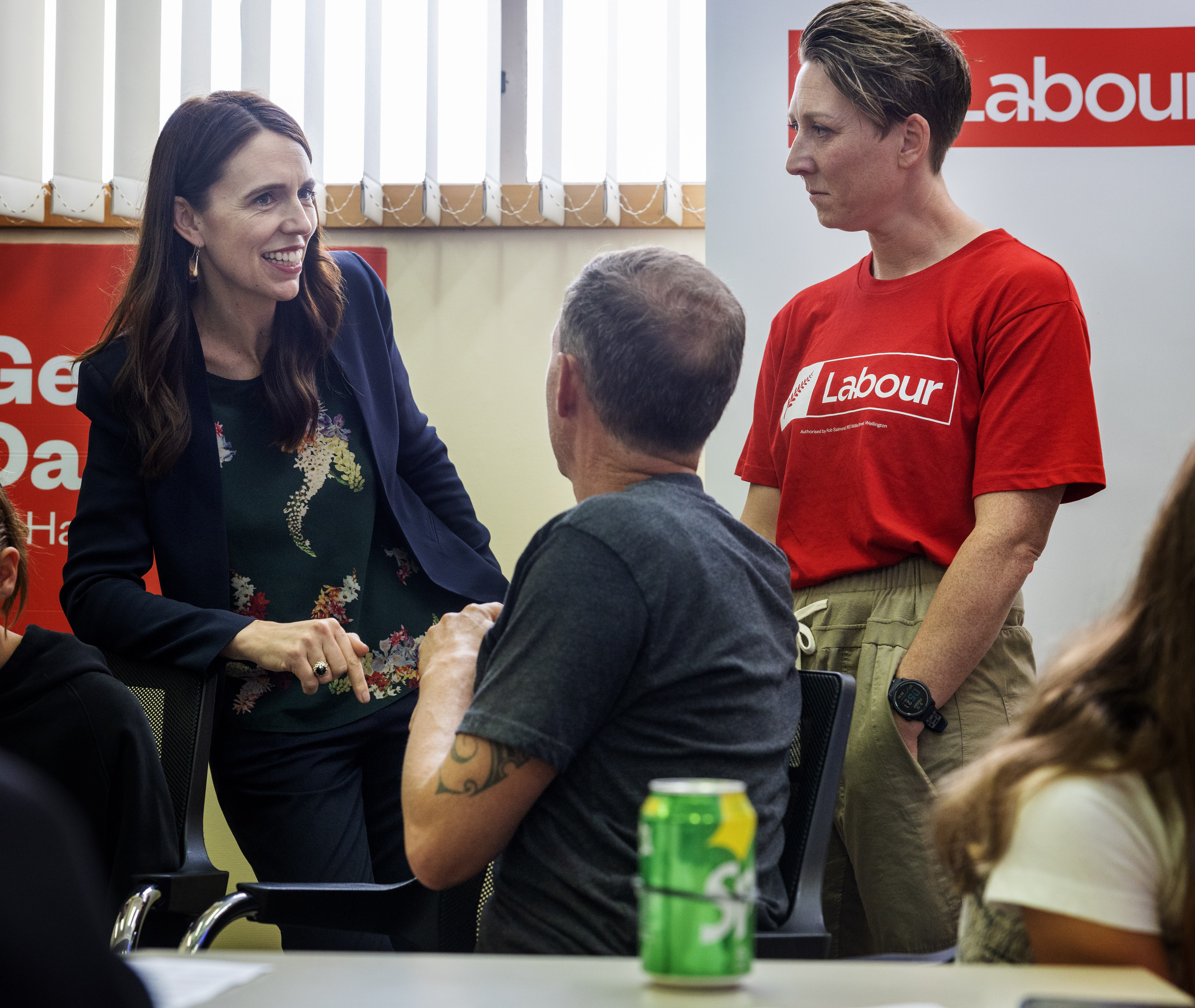 Prime Minister Jacinda Ardern speaks with Hamilton West byelection candidate Georgie Dansey (right) and Hamilton East MP Jamie Strange. Photo / Mike Scott