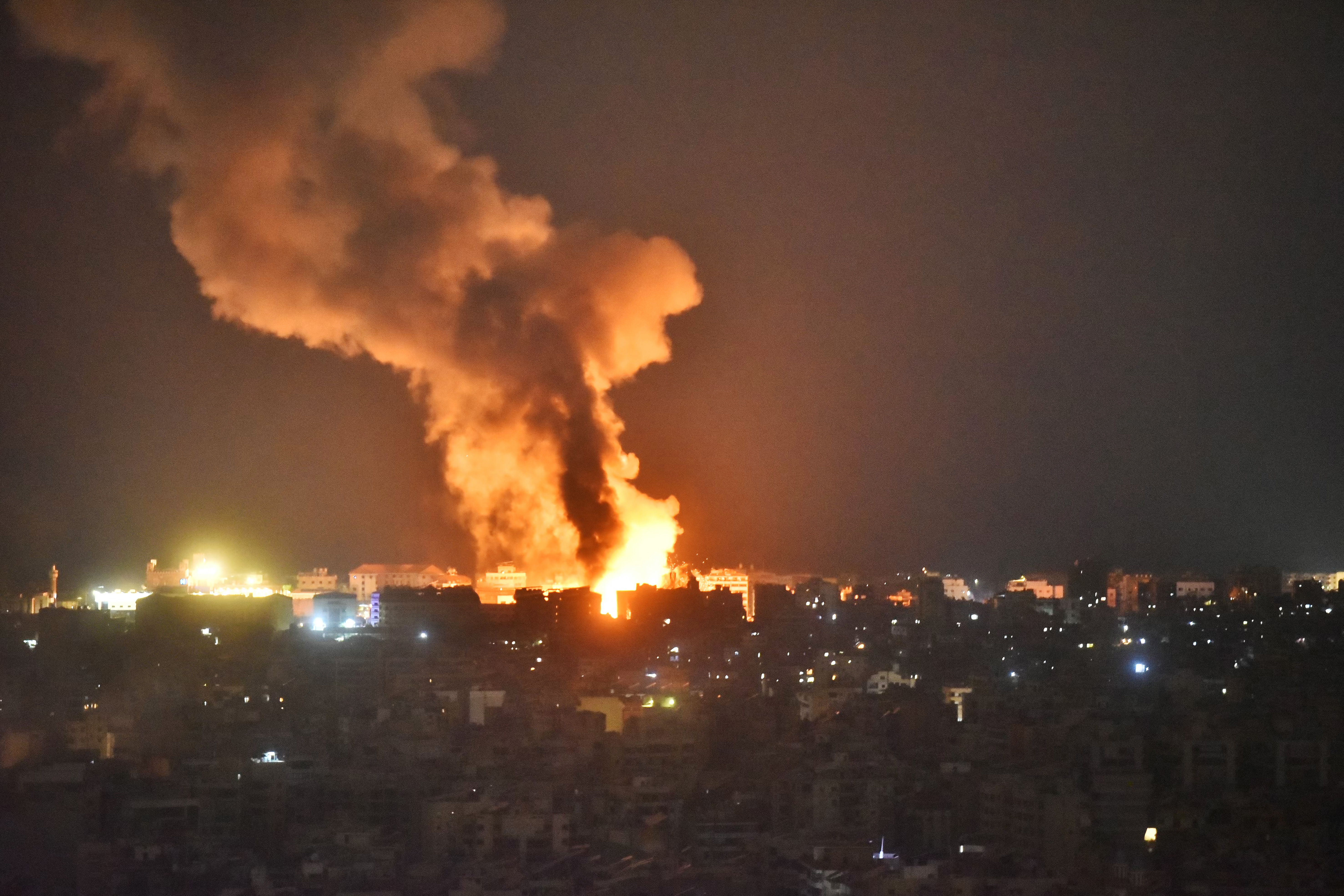 Fire and smoke rise from an area targeted by an Israeli airstrike on Beirut's southern suburb on October 6, 2024. Photo / AFP