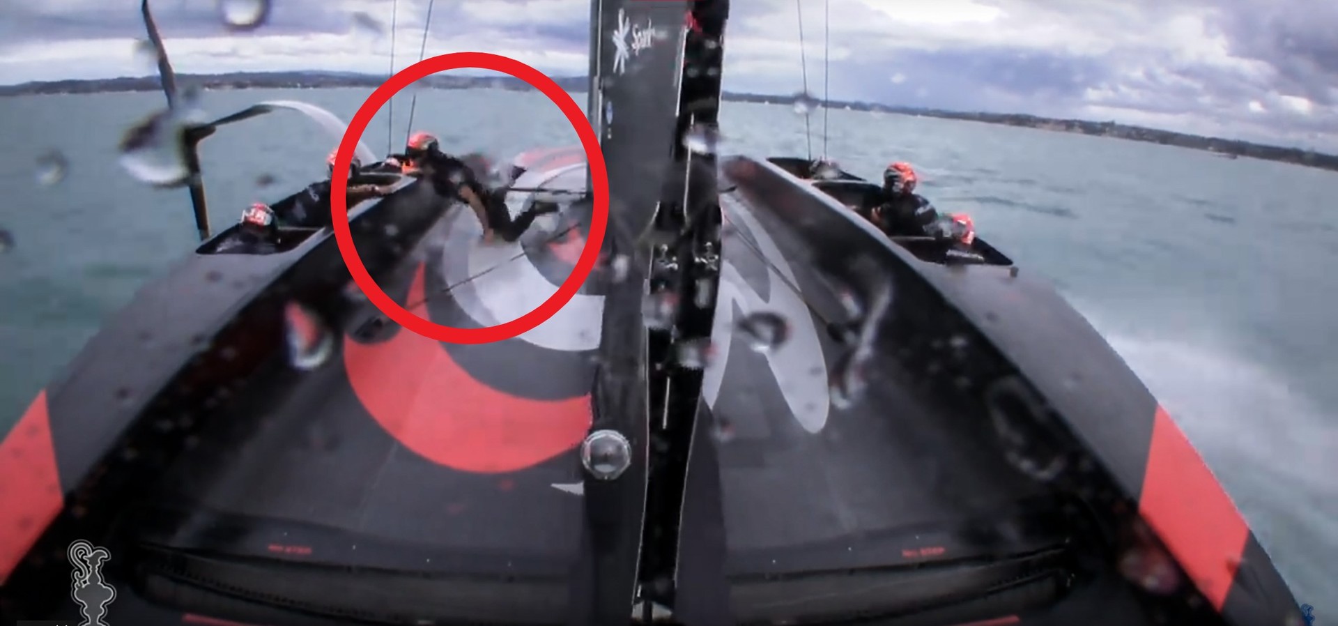 Peter Burling slips during the fifth leg of race one. Photo / America's Cup, supplied