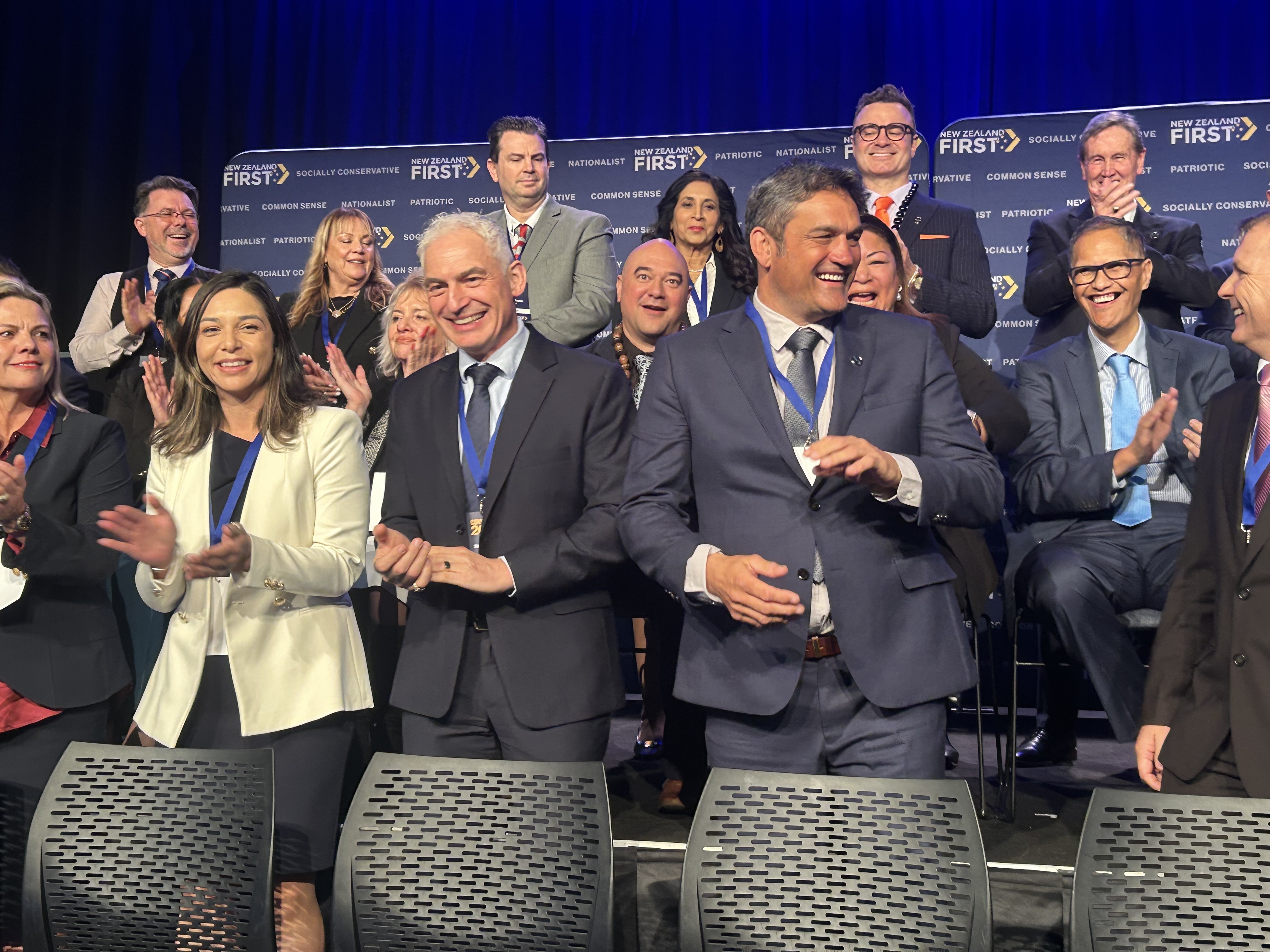 NZ First candidates Stuart Nash (centre left) and Taine Randell (centre right) at the party's convention in Auckland. Photo / Adam Pearse 