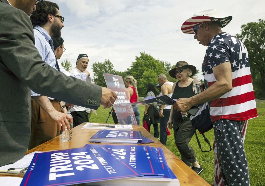 Donald Trump supporters preparing for a campaign rally in the Bronx borough of New York. Photo / AP