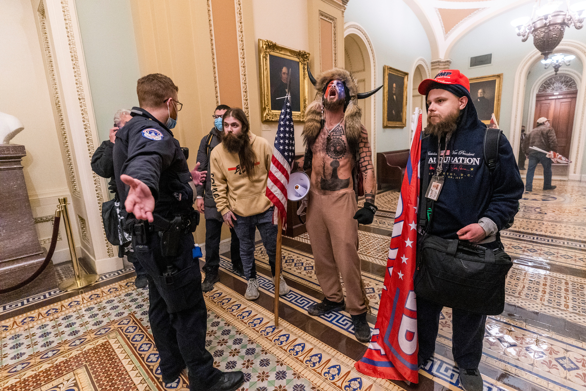 Supporters of President Donald Trump confronted by Capitol Police officers outside the Senate Chamber inside the Capitol on January 6. Photo / Manuel Balce Ceneta, AP, File