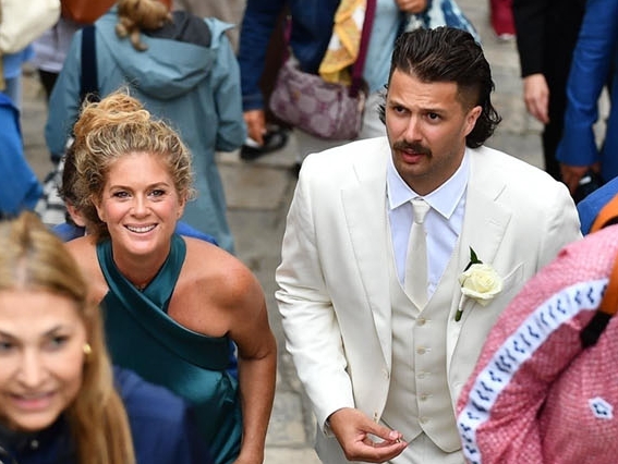 Rachel Hunter with her son Liam Stewart, walking into his wedding venue in Croatia. Photo / Backgrid Australia