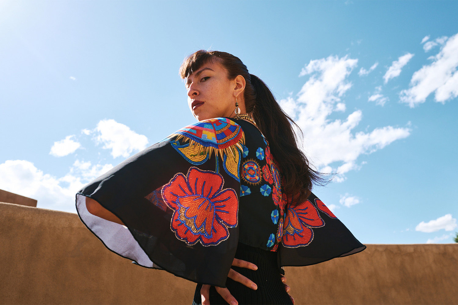 Peshawn Bread, a designer with Comanche, Kiowa and Cherokee roots, who presented a disco-themed line called House of Sutai during Native Fashion Week. Photo / Simbarashe Cha for The New York Times