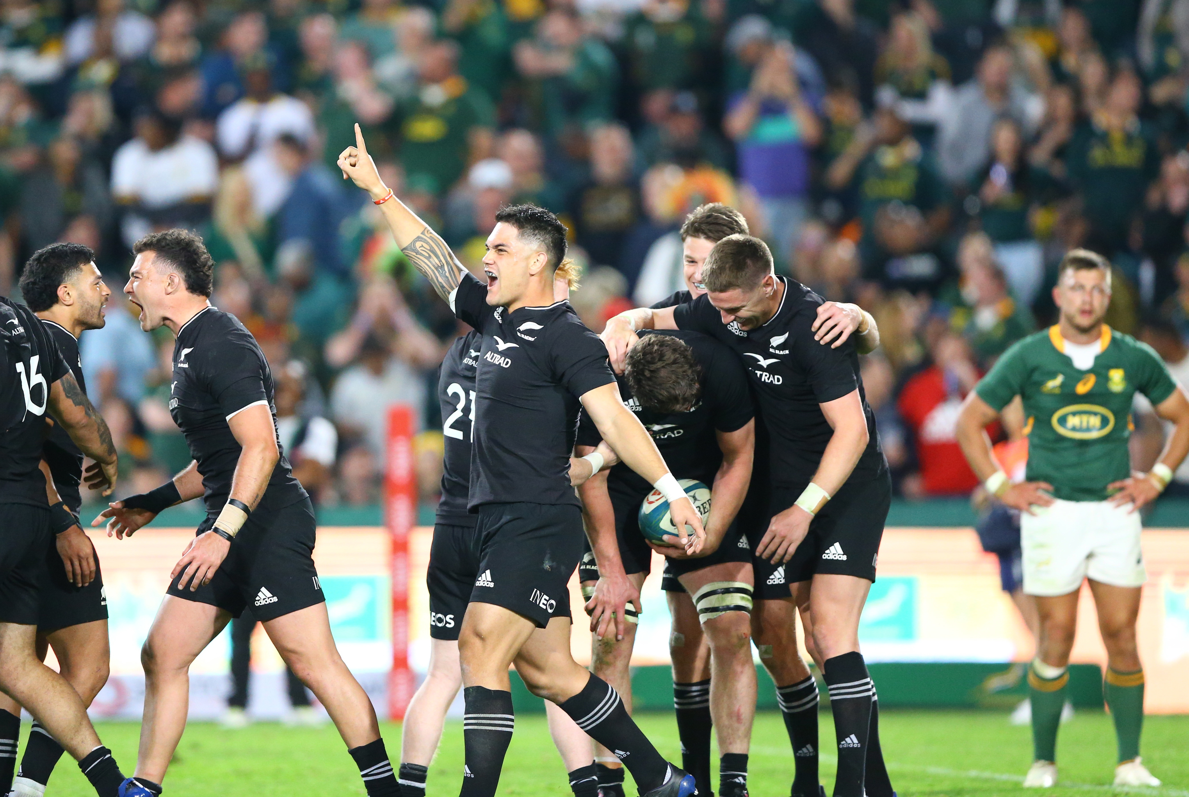 The All Blacks celebrate a famous win at Ellis Park. Photosport