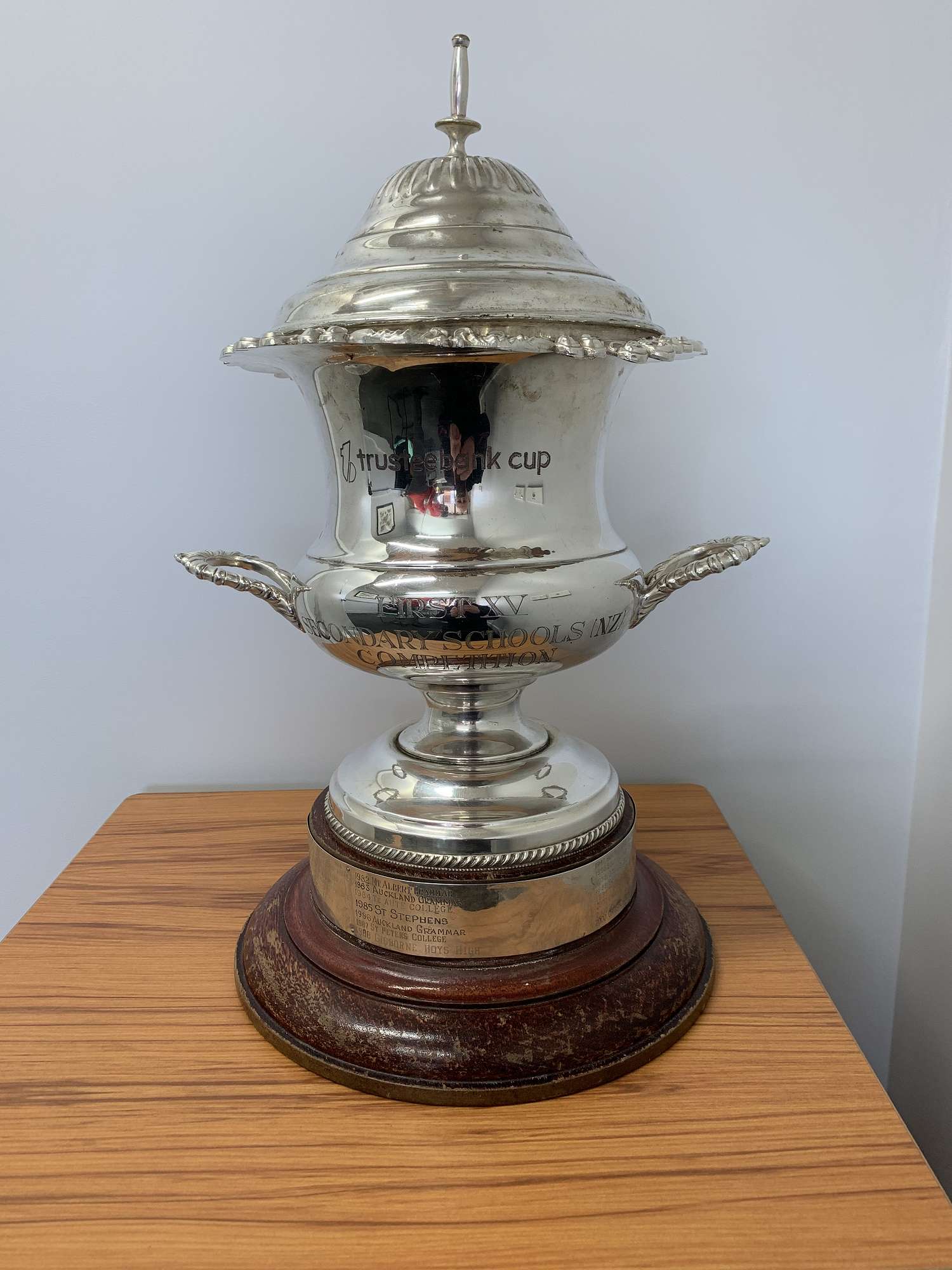 Nelson College holds the Trustbank Cup. Photo / NZ Herald