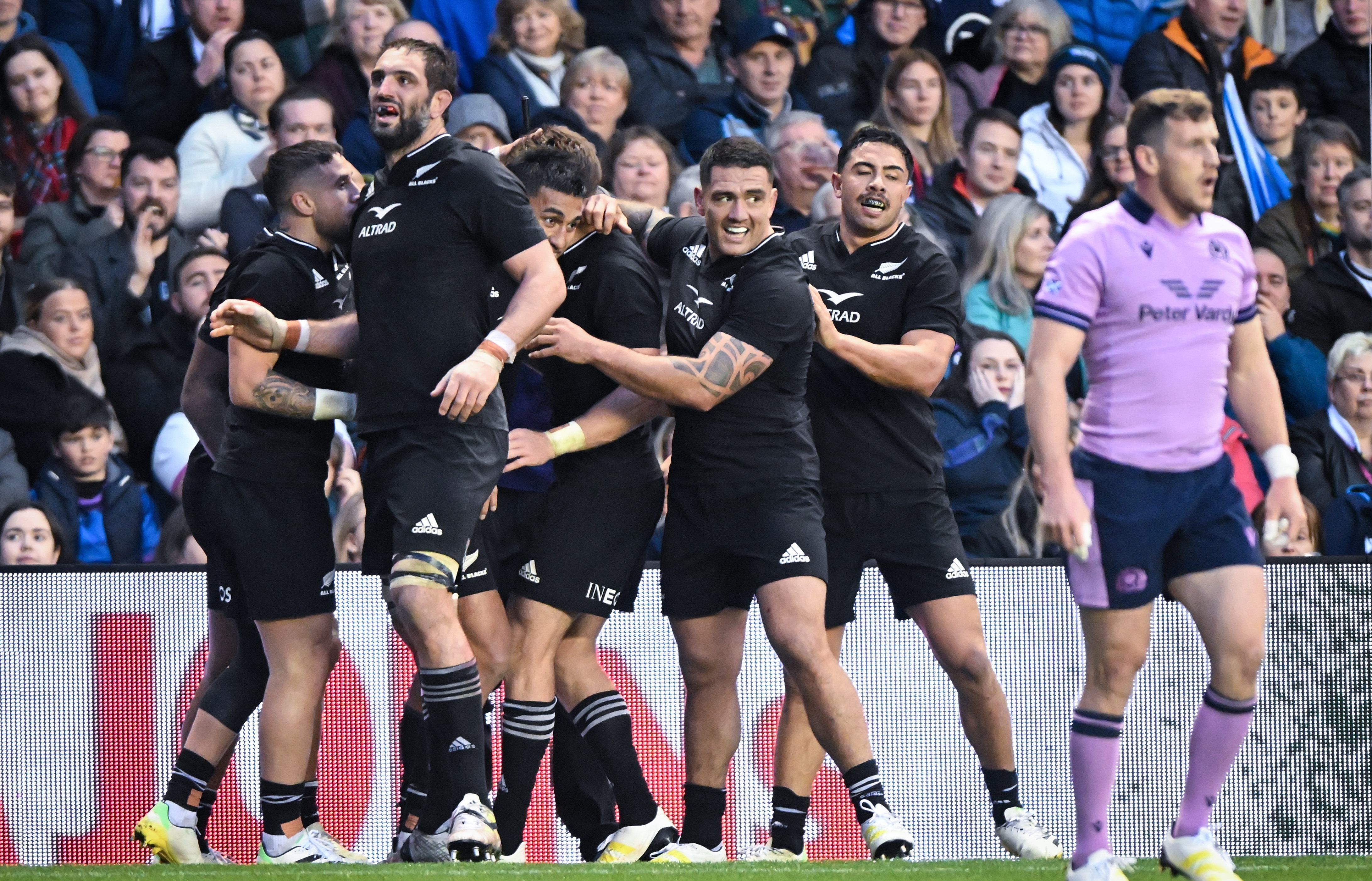 The All Blacks celebrate a try during their comeback victory over Scotland. Photo / Photosport