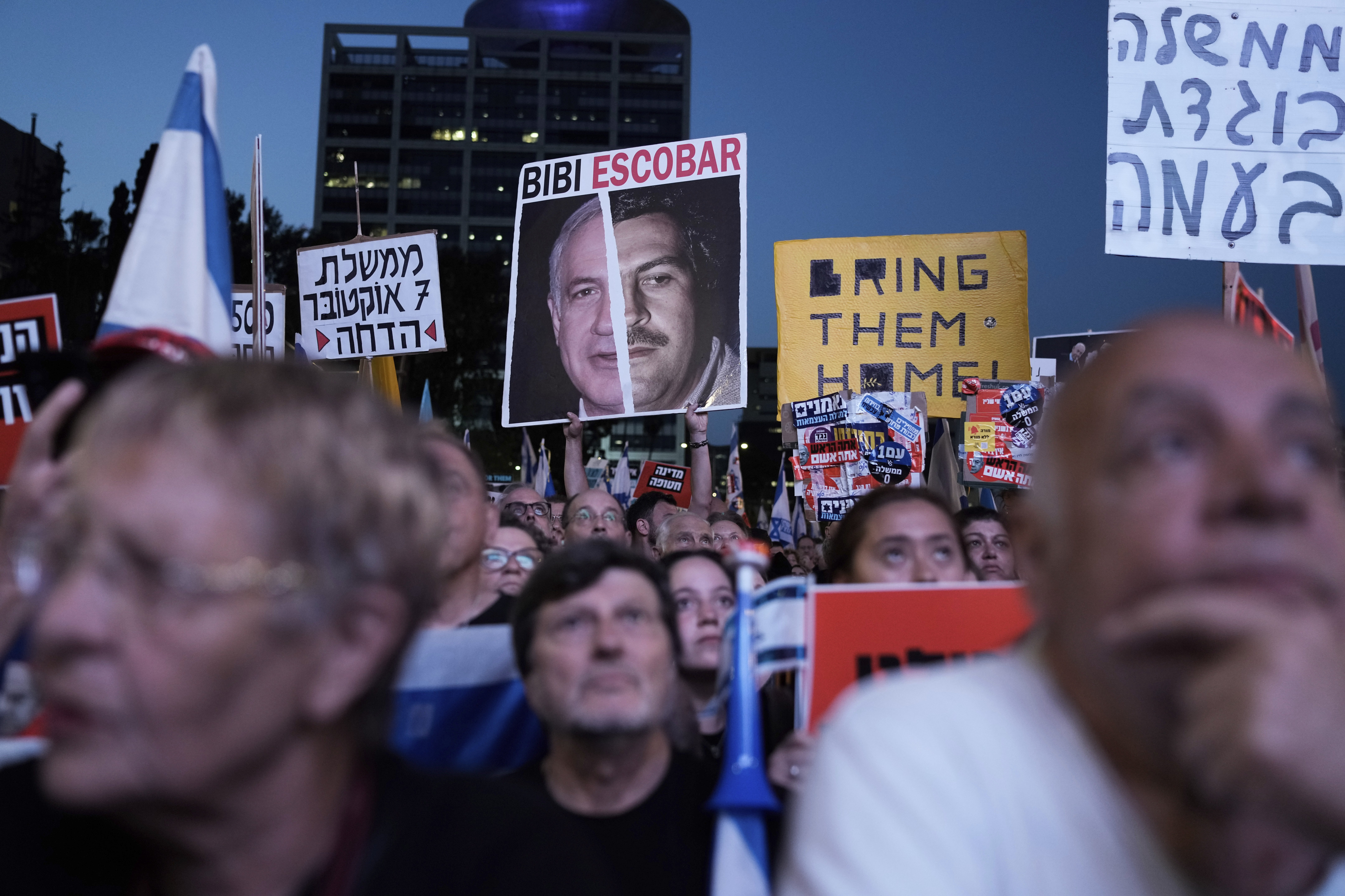 People protest against Israeli Prime Minister Benjamin Netanyahu's government and call for the release of hostages held in the Gaza Strip by the Hamas militant group, in Tel Aviv, Israel. Photo / AP