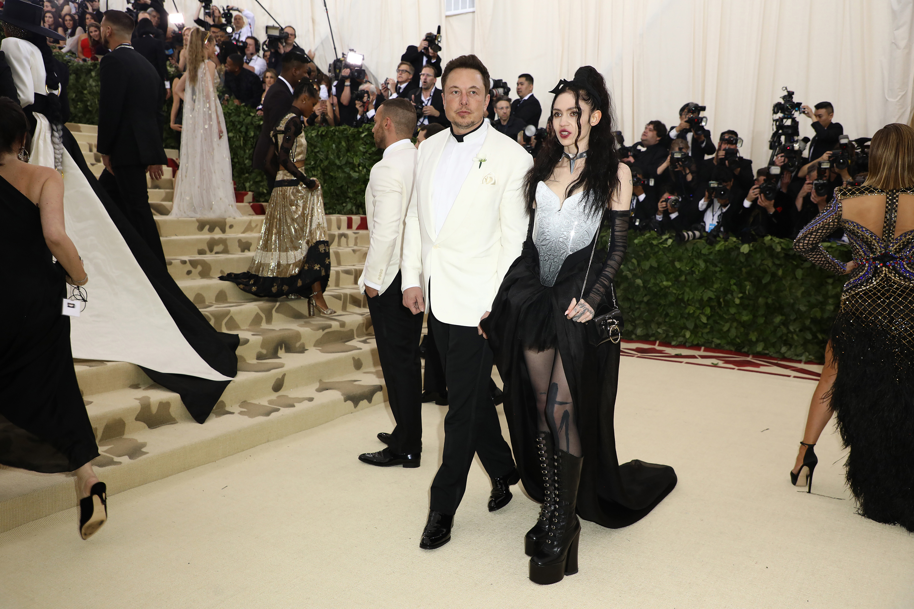 Musk and Claire Boucher, the musician better known as Grimes, at the Met Gala in 2018. The two are in custody disputes over their three children. Photo / Damon Winter, The New York Times