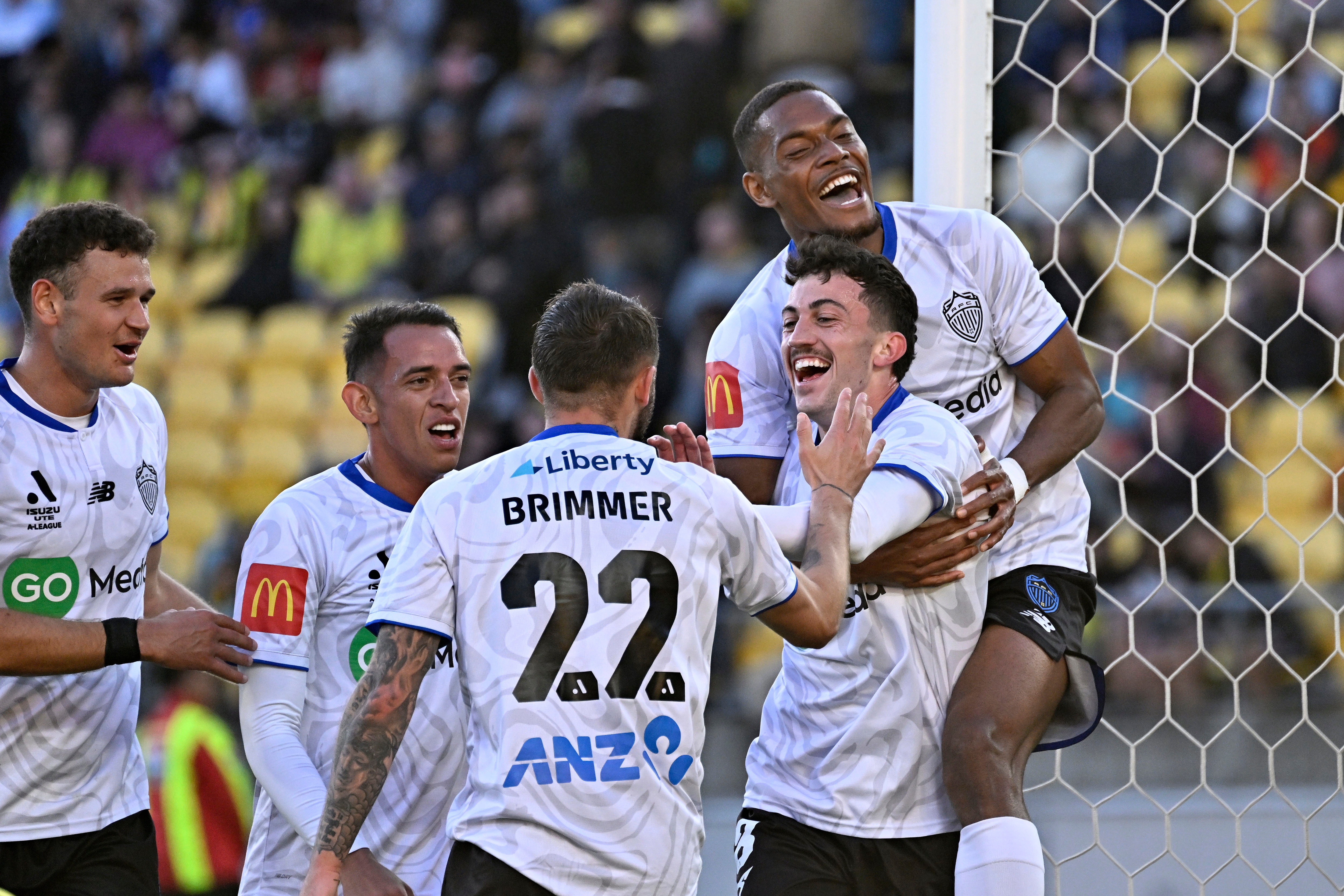 Auckland FC celebrate their second goal against the Phoenix. Photo / Photosport