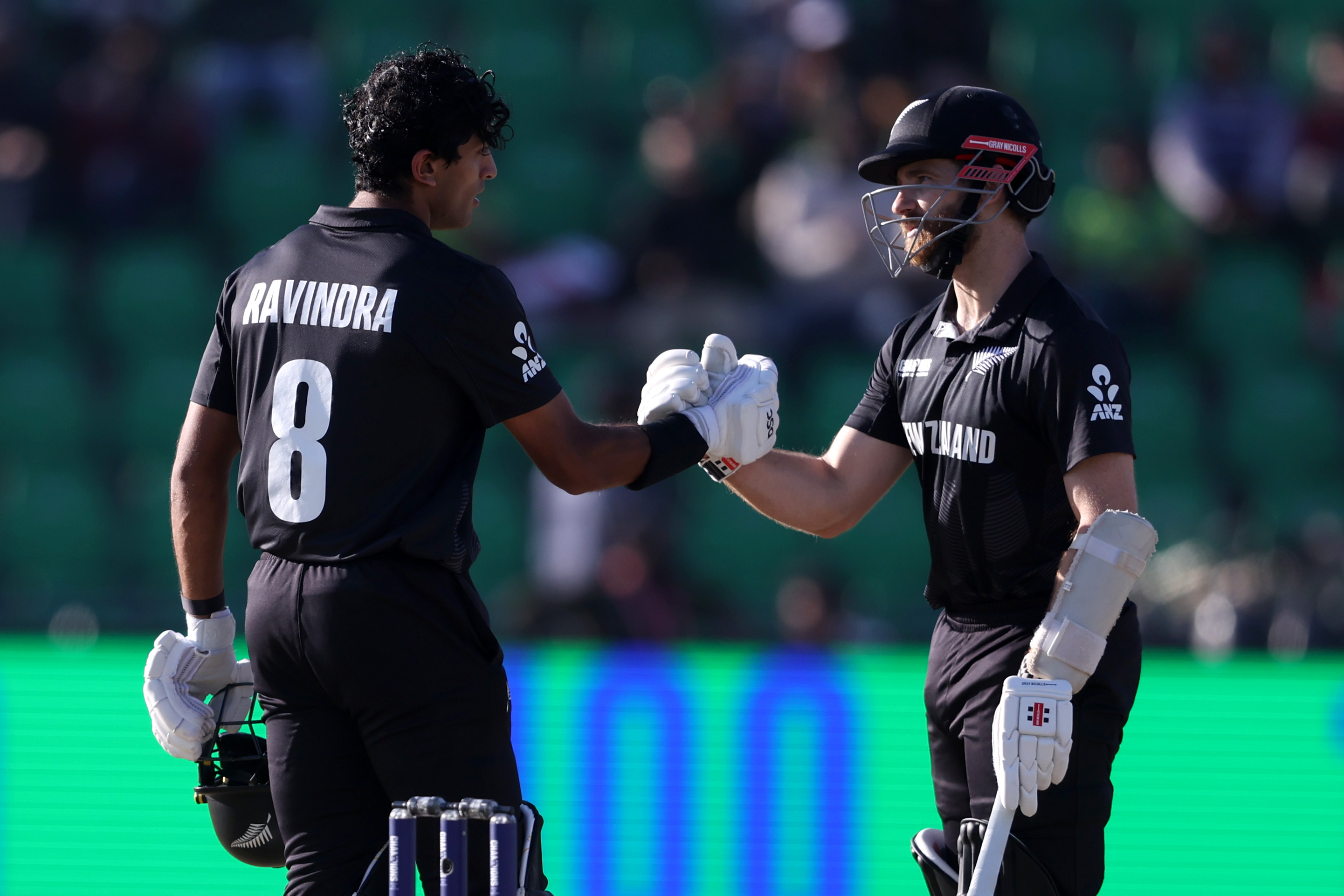 Rachin Ravindra is congratulated by Kane Williamson after reaching his century against South Africa in the ICC Champions Trophy in March this year. Photo / Getty Images