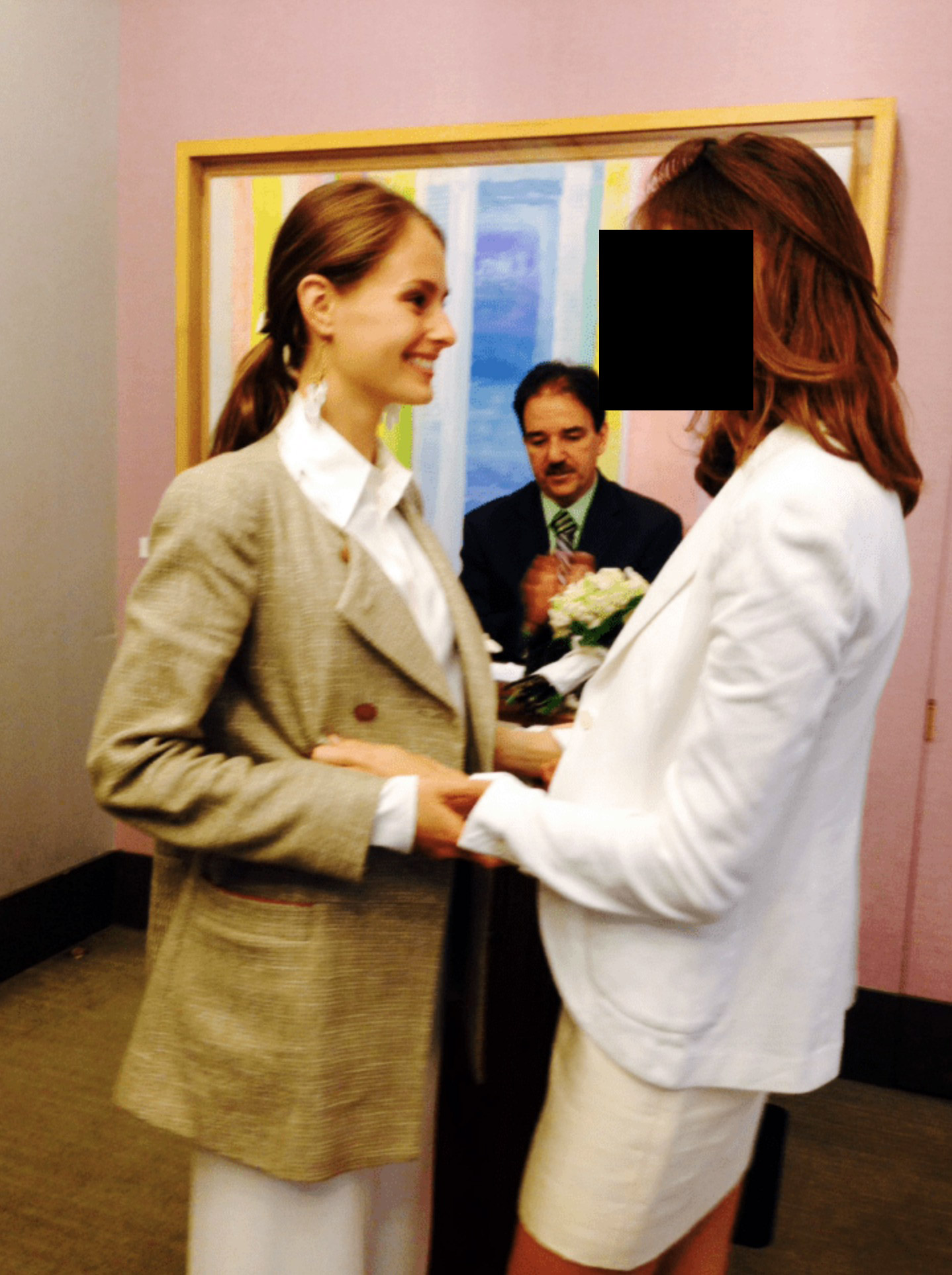 Shuliak, left, marrying a woman in 2013 whose face has been obscured by The New York Times because she has said that she was a victim of Jeffery Epstein. Photo / Department of Justice via The New York Times