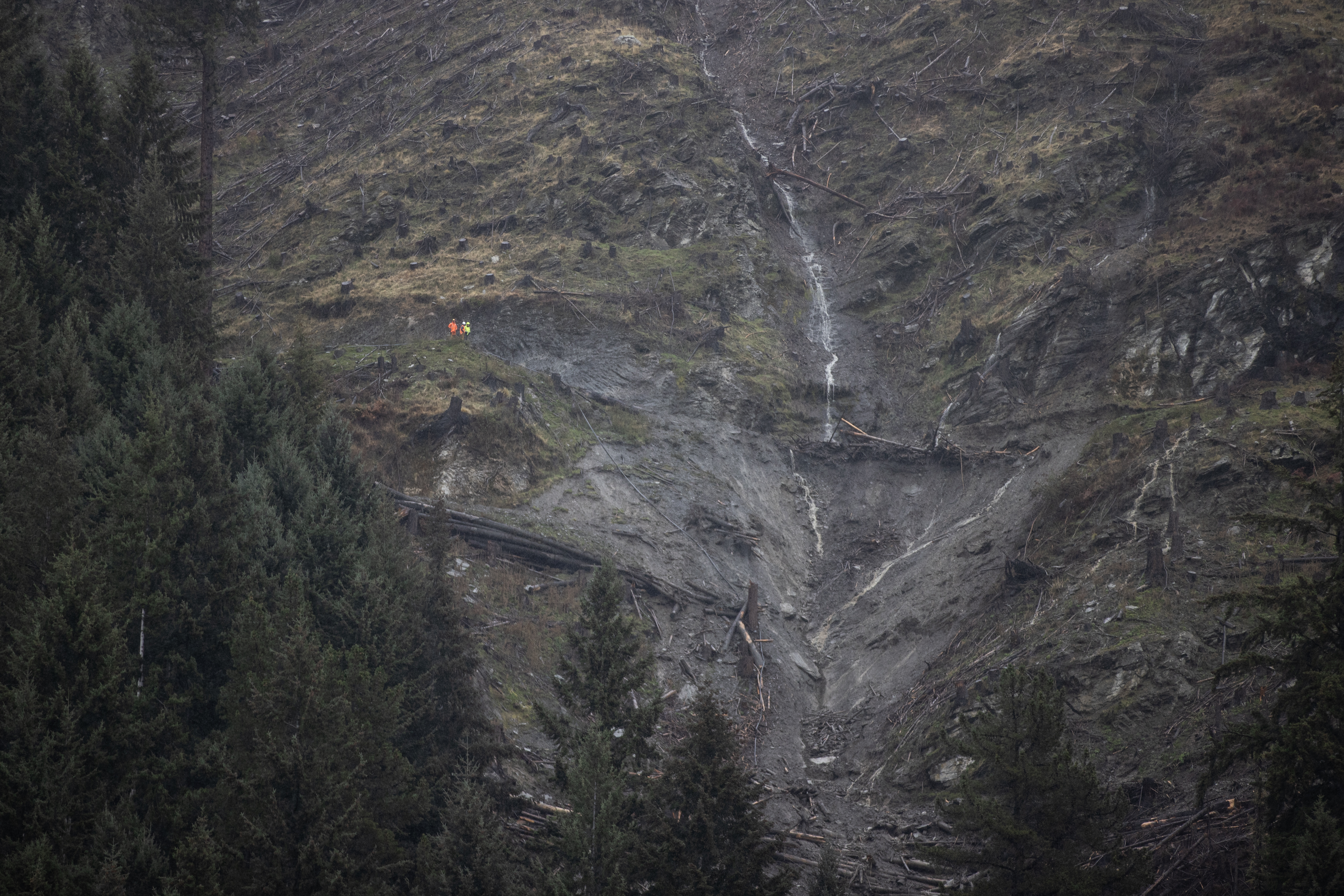 The hillside above Queenstown is being looked at closely this morning after heavy rain caused slips. Photo / George Heard