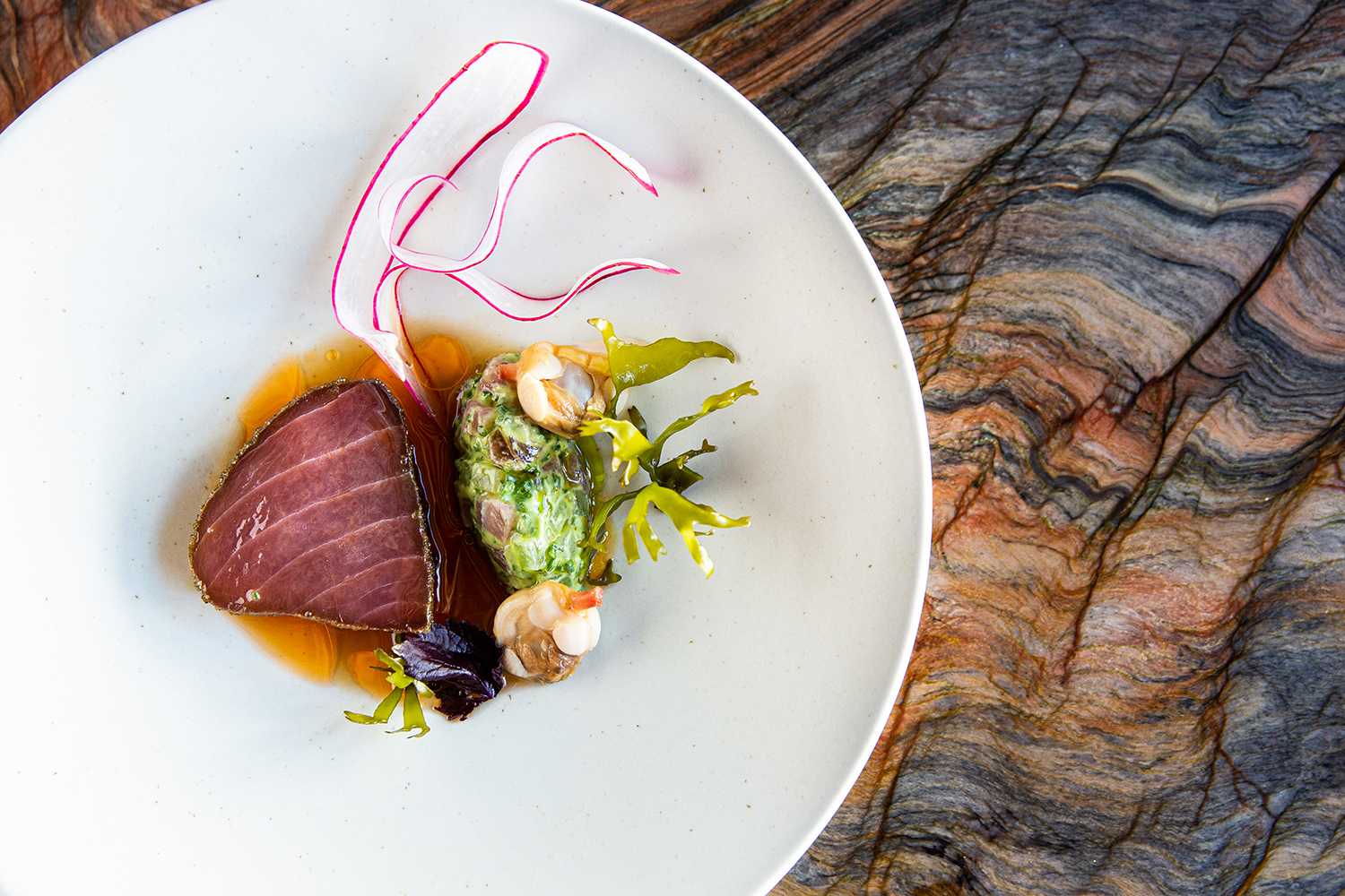 Air dried tuna with pickled clams. Photo / Babiche Martens