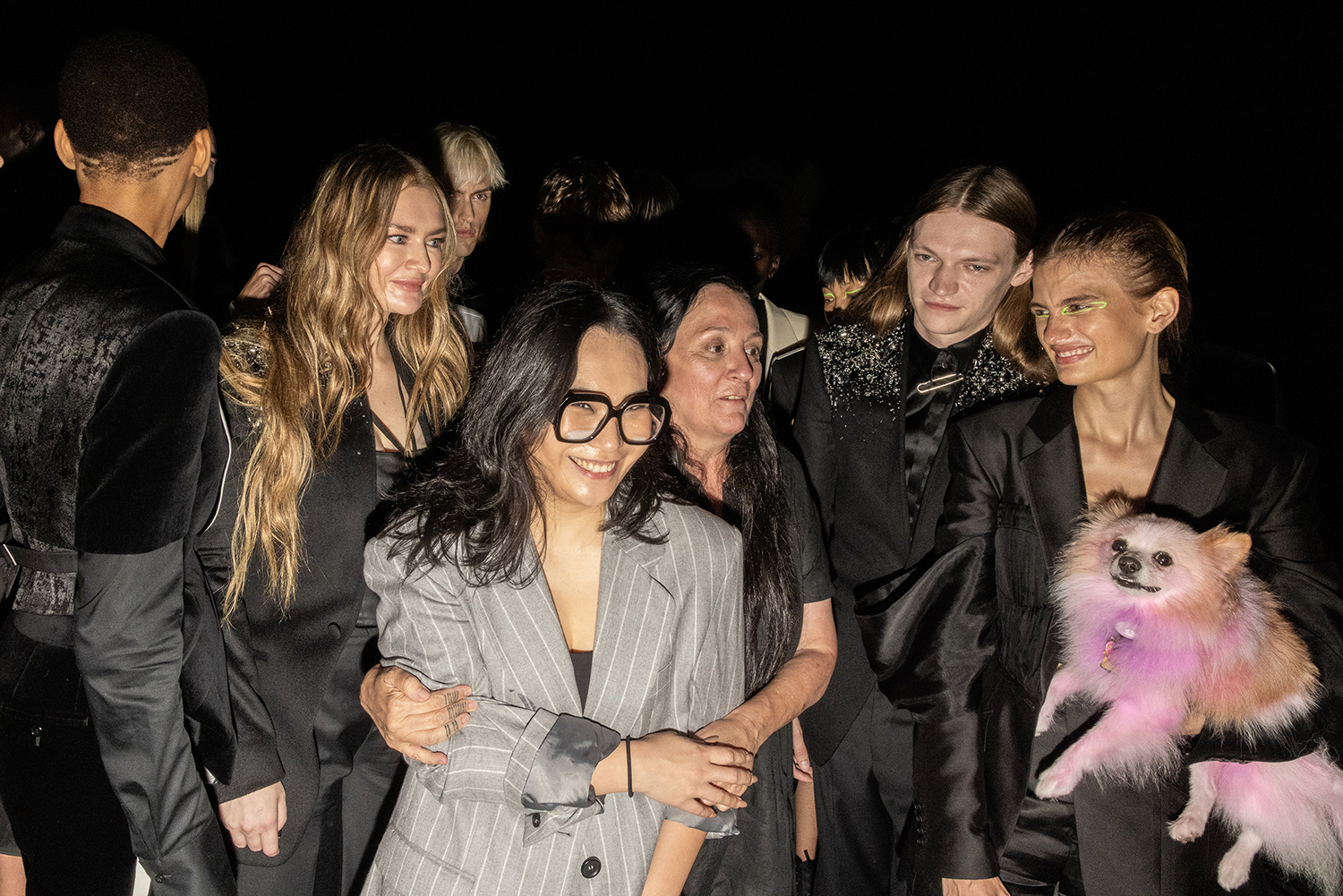 From left, Anna Sorokin, Shao Yang and Kelly Cutrone gather for photos after the Shao fashion show. Photo / Rebecca Smeyne, The New York Times