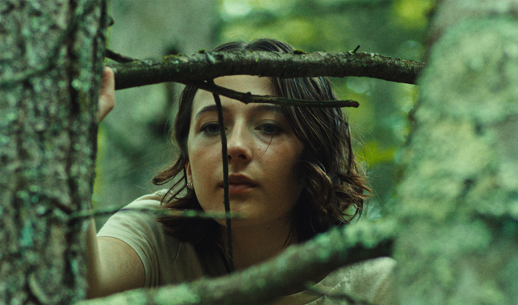 Sam is quiet, but observational throughout the film – alert to potential dangers. 
