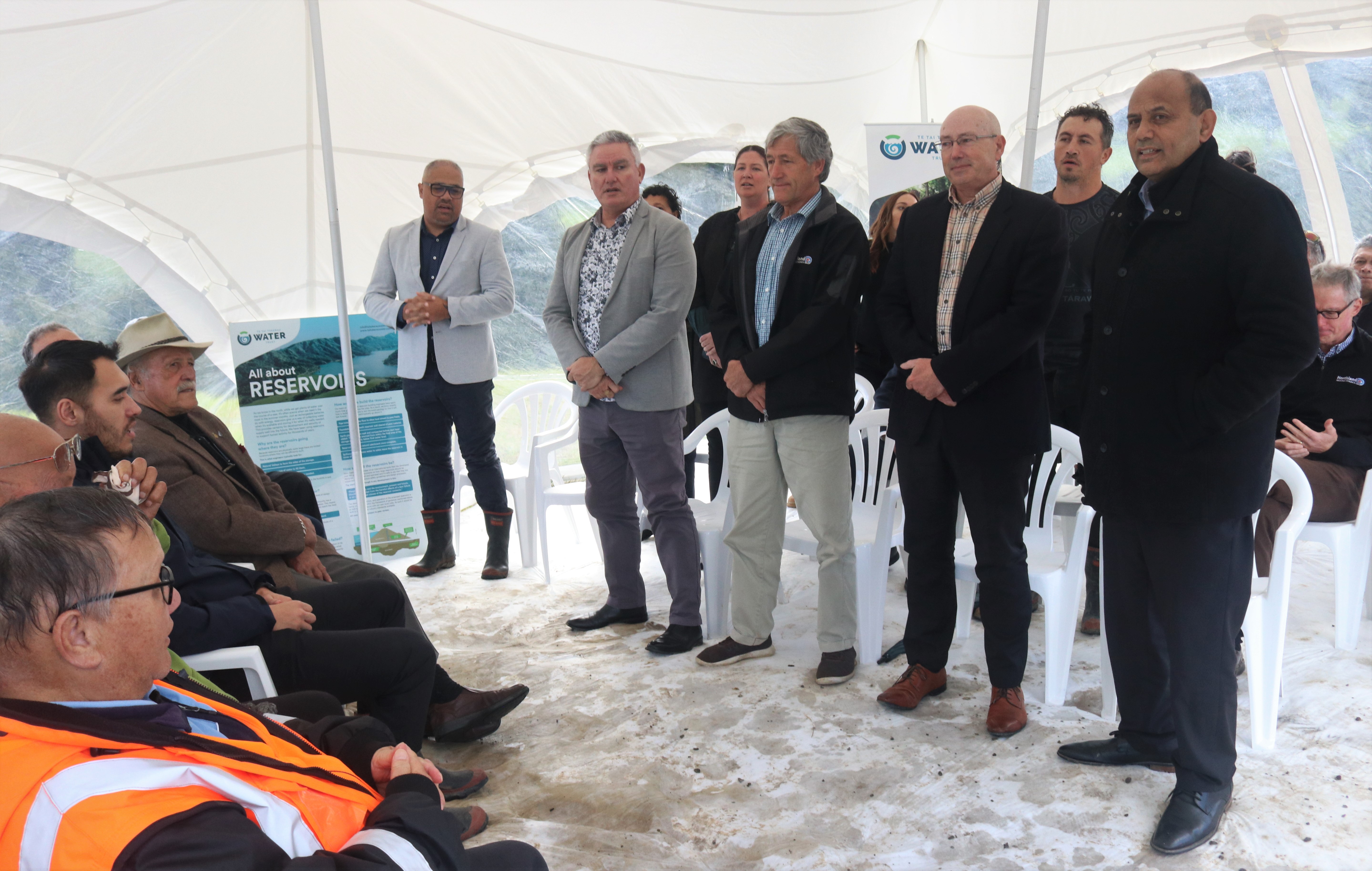 (From left): Tourism Minister Peeni Henare, Minister for Māori-Crown Relations Kelvin Davis, Northland regional councillor Marty Robinson and Far North Holdings chief executive Andy Nock sing in support of Māori Development Minister Willie Jackson’s speech. Photo / Peter de Graaf