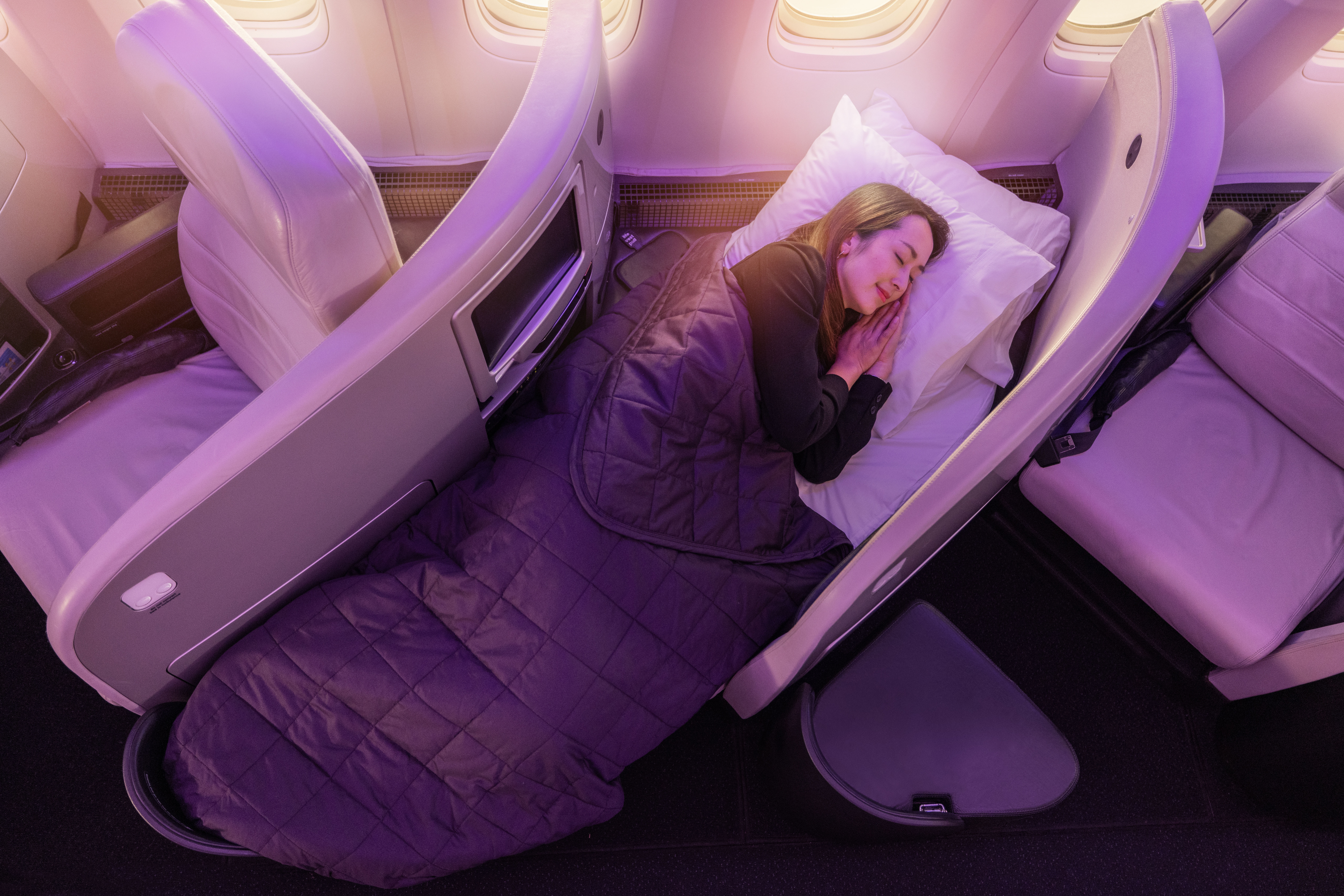 Passengers flying Business Premier enjoy lie-flat seats with a bed length of 198cm