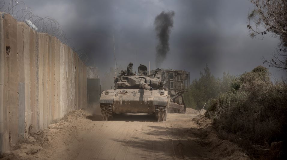 An Israeli battle tank entering Lebanon from northern Israel. Photo / AFP