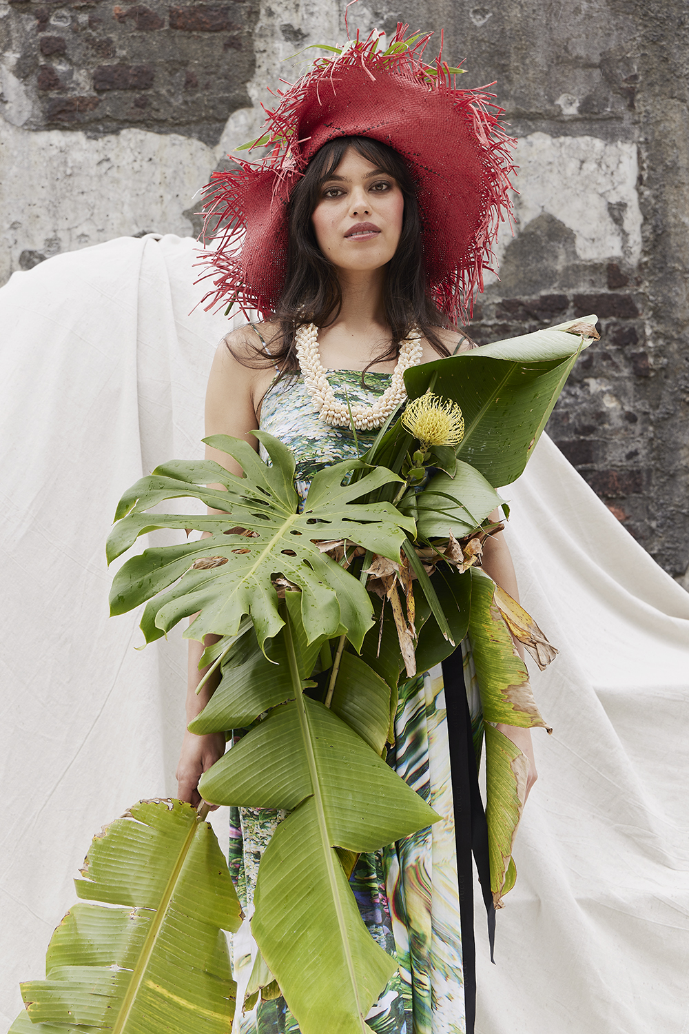 Karen wears Kowtow dress $359. Seventh & Fig hat, $399, from World. Stylist’s own necklace. Photo / Mara Sommer