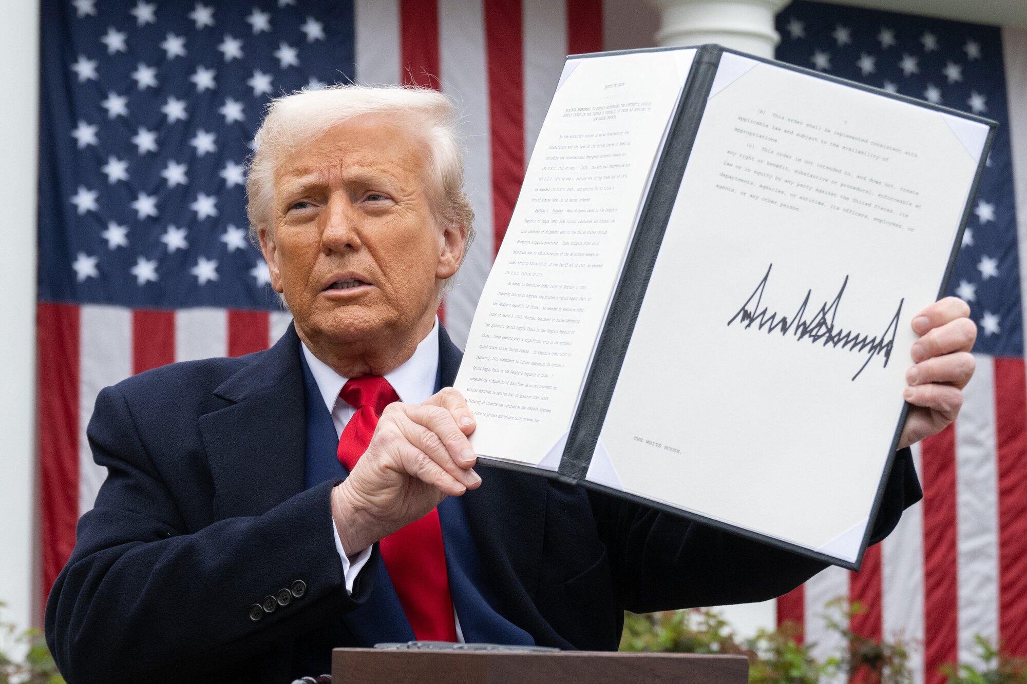 US President Donald Trump holds a signed executive order after delivering remarks on reciprocal tariffs at the White House. Photo / AFP