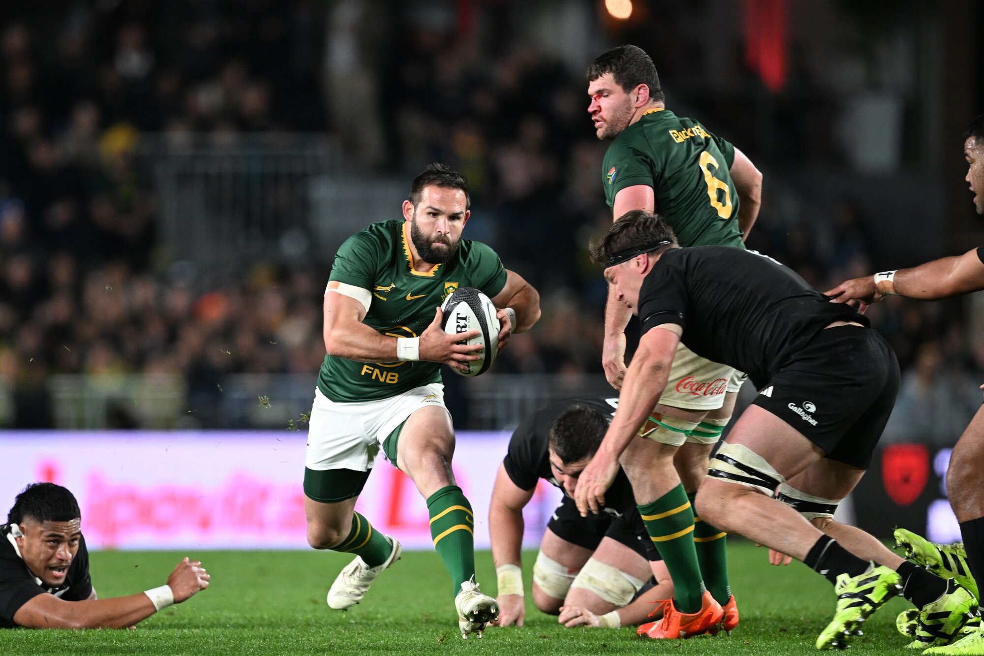 Springboks replacement halfback Cobus Reinach makes a break against the All Blacks. Photo / Photosport