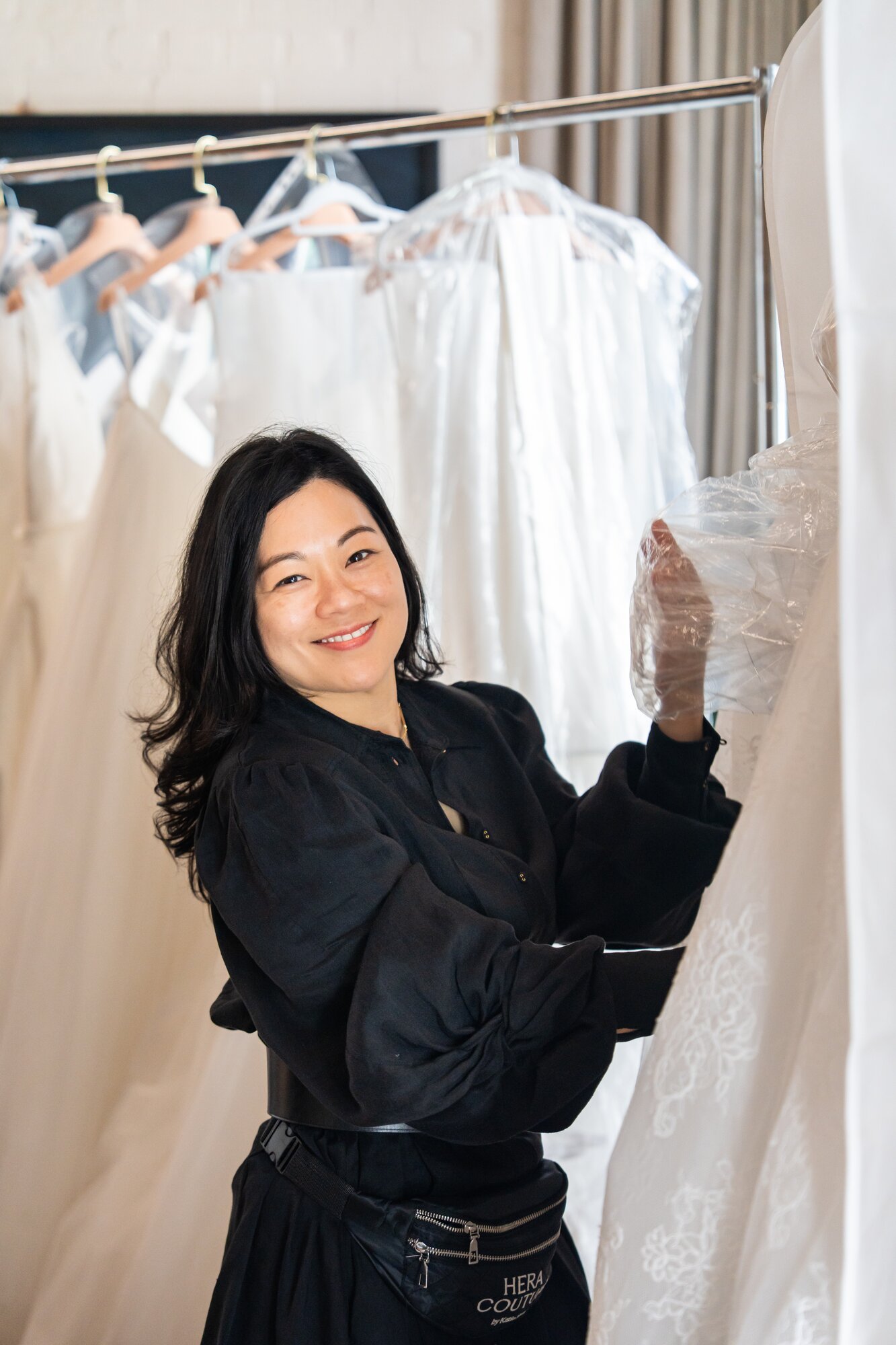 Katie Yeung with her dresses ahead of her 15th anniversary celebrations. Photo / Supplied