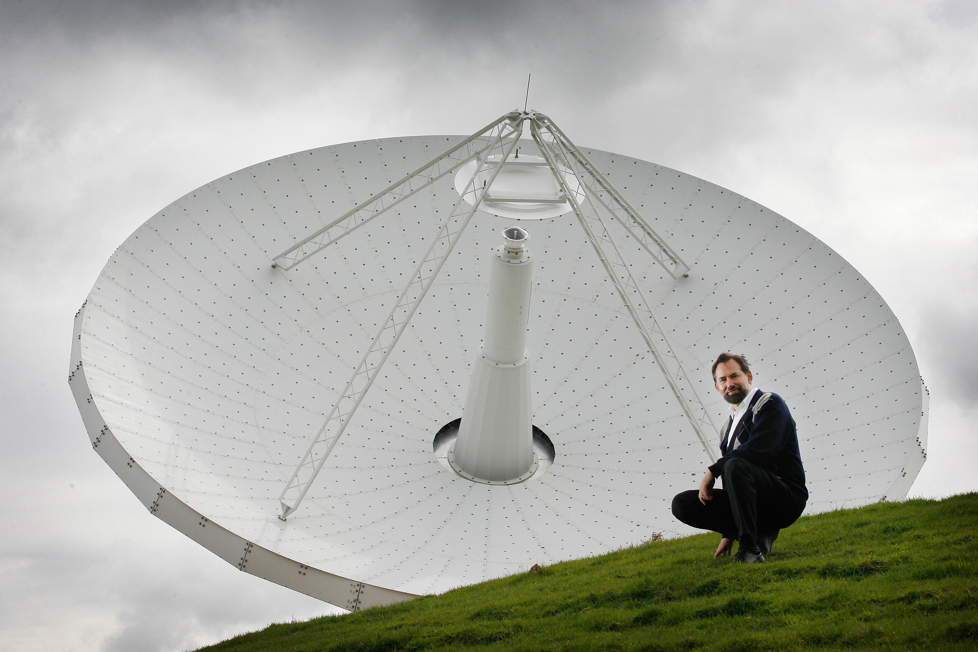 Professor Sergei Gulyaev, director of AUT's Institute of Radio Astronomy and Space Research, pictured with the Warkworth observatory's 30m radio telescope in 2008. Photo / Greg Bowker